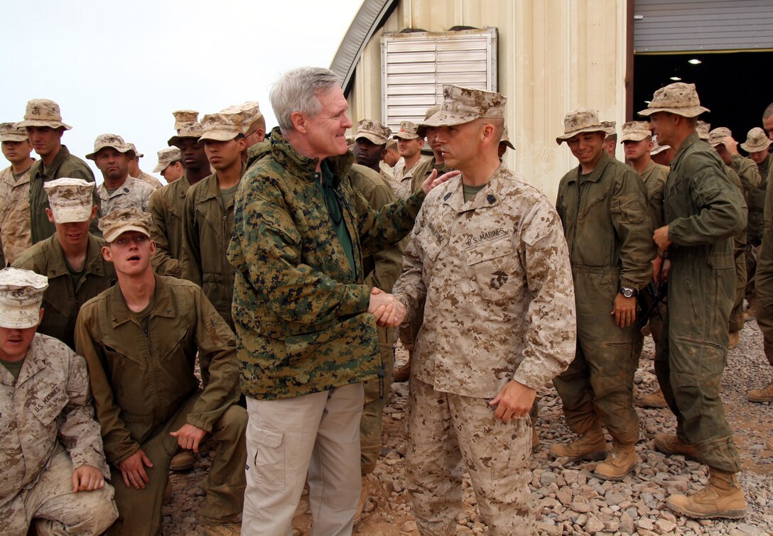 The Honorable Ray Mabus, Secretary of the U.S. Navy, expresses his thanks to Sgt. Maj. George Muskivicz, the Headquarters Battalion, 4th Marine Division sergeant major, following a tour of the logistics support area here June 5.  Muskivicz is currently serving as the Task Force African Lion sergeant major during this annual joint and combined exercise with the Moroccan Armed Forces.  This year's African Lion involves about 700 Marines and sailors from Marine Forces Reserve units throughout the United States.