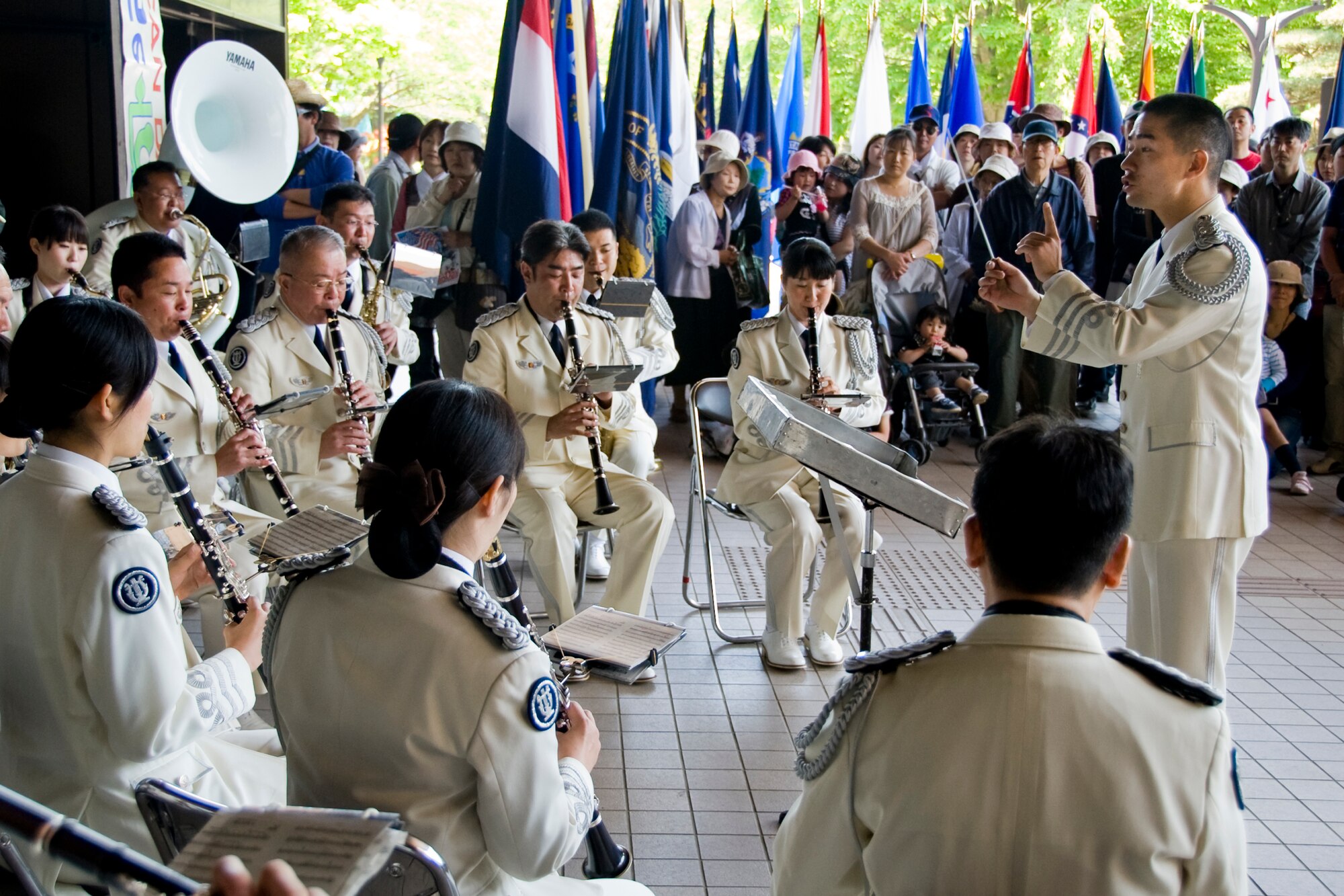MISAWA CITY, Japan -- The Japan Air Self-Defense Force Northern Area Band, conducted by JASDF Lt. Shitsuki Yamamoto, performs during the 22nd Annual American Day festival June 6 at the Misawa Civic Center. The band performed musical pieces such as Washington Cross and American Patrol. (U.S. Air Force photo/Senior Airman Jamal D. Sutter)