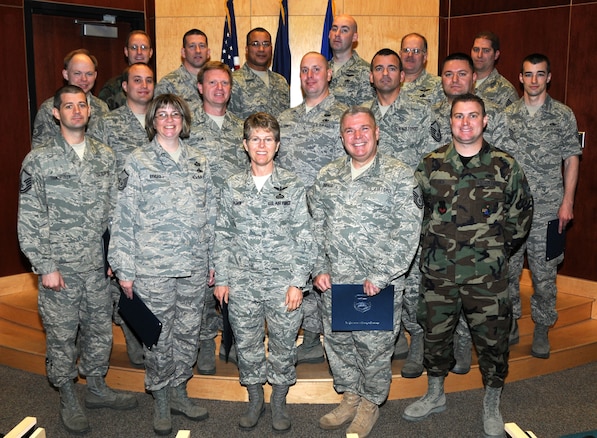 Eighteen members of the Utah Air National Guard received their Community College of the Air Force Degrees during a graduation ceremony on base May 2. Graduates earned their degrees by fulfilling all training and educational credits required for their jobs.  (U.S. Air Force photo by Staff Sgt. Emily Monson)	