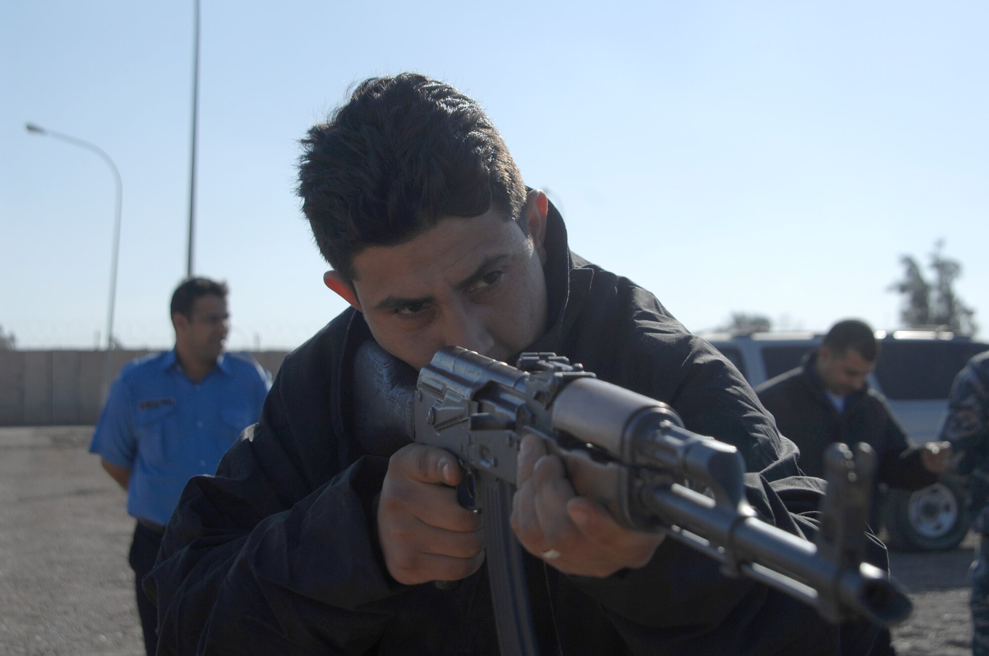 Iraqi Police perform weapons handling training at Taji Law Enforcement Academy, on Camp Taji, Iraq, Jan. 6, 2010. (U.S. Army photo by Spc. David C. Innes Jr./ Released)