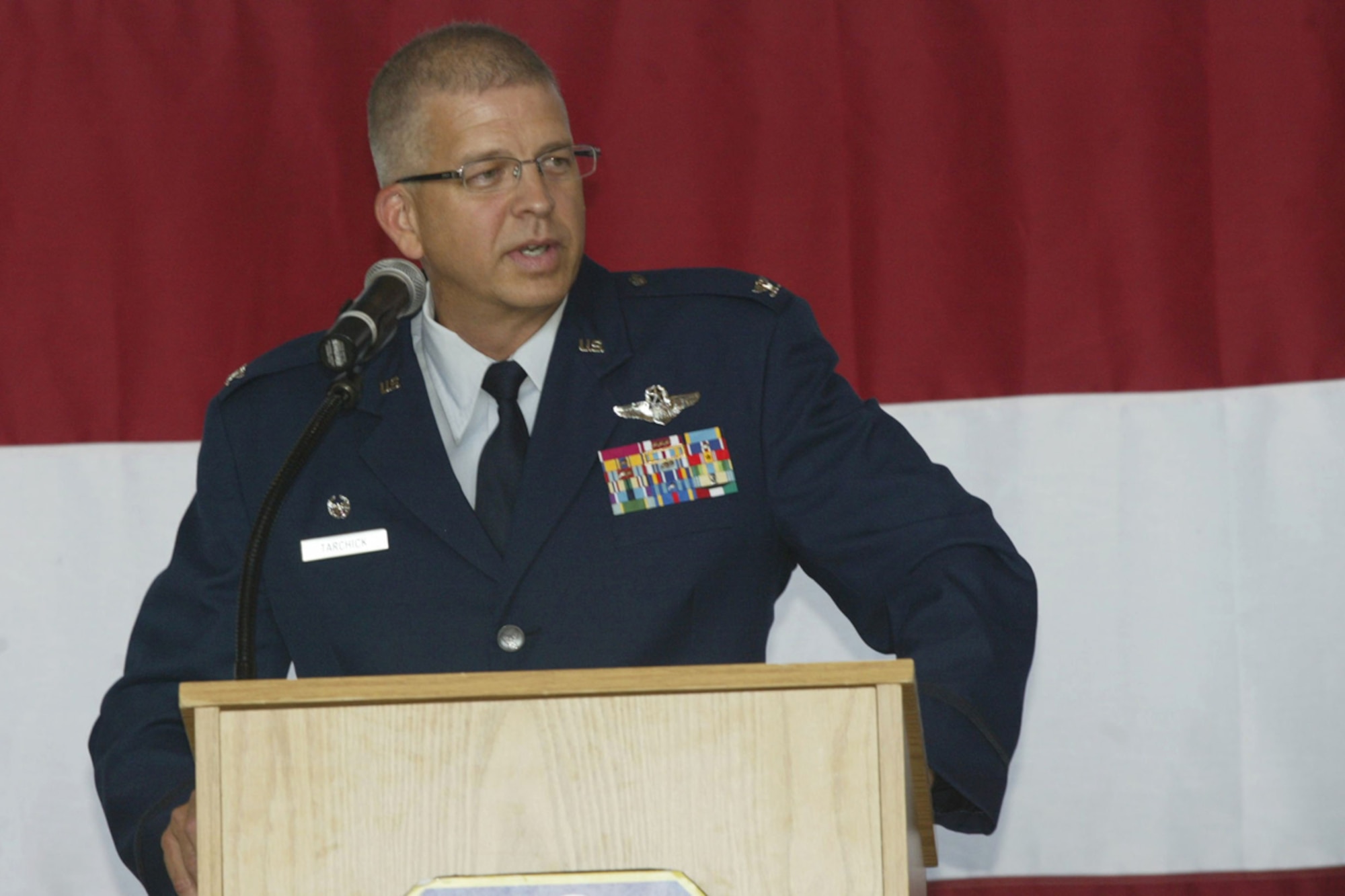 Col. Timothy E. Tarchick, newly assigned commander of the 94th Airlift Wing speaks to Airmen at his change of command ceremony here June 5. (U.S. Air Force Photo/Don Peek)
