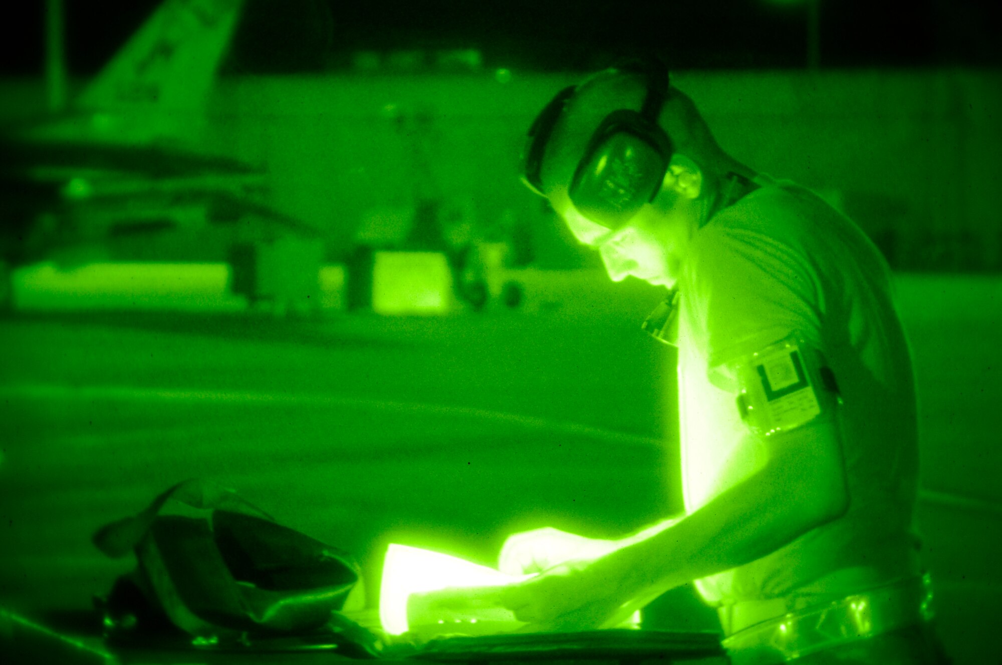 U.S. Air Force Airman, an F-16 Fighting Falcon crew chief assigned to the 144th Fighter Wing Aircraft Maintenance Squadron Fresno Air National Guard, California, reviews an aircraft maintenance log during an Operational Readiness Inspection Coronet White, Fresno Air National Guard, Fresno, June 7, 2010. The 144th FW conducts an inspection on how well they can generate aircraft for the ORI. (U.S. Air Force Photo by Technical Sgt. Robin Meredith/Released)