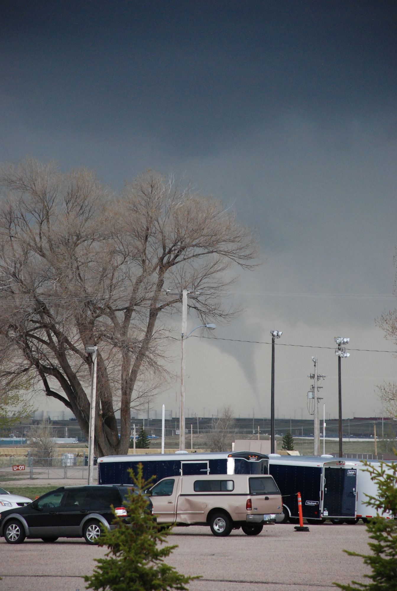 A tornado touches down roughly six miles southeast of the base May 18. A tornado warning was issued shortly after the sighting, and base personnel were directed to seek shelter in place. (U.S. Air Force photo/Staff Sgt. Chad Thompson)