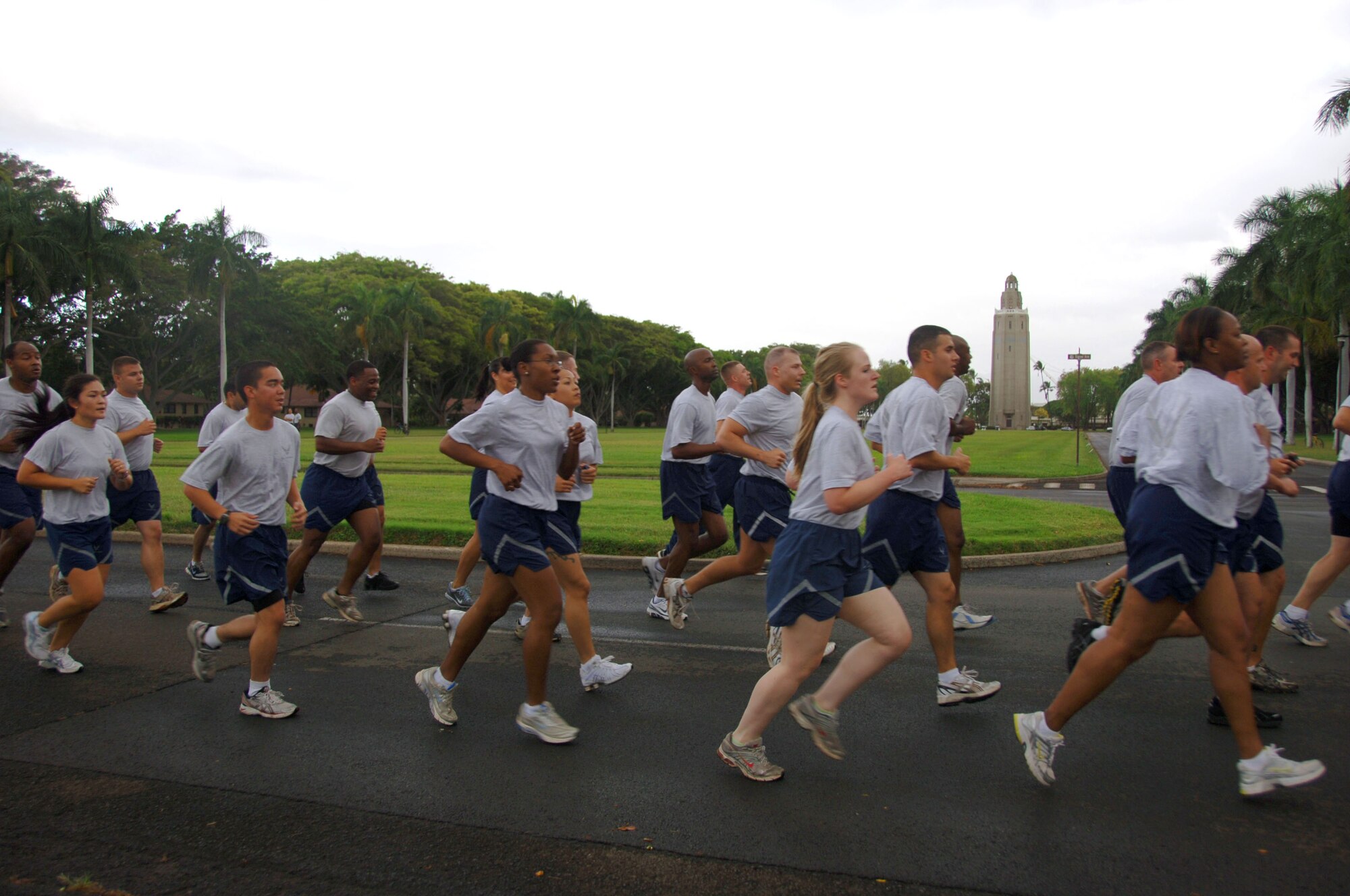 Airmen run during physical training here, May 7. Airmen who earn an "excellent" on the new fitness test will now only have to test once a year according to a new revision to the Air Force Fitness Program. (U.S. Air Force photo/Staff. Sgt. Nathan Allen)
