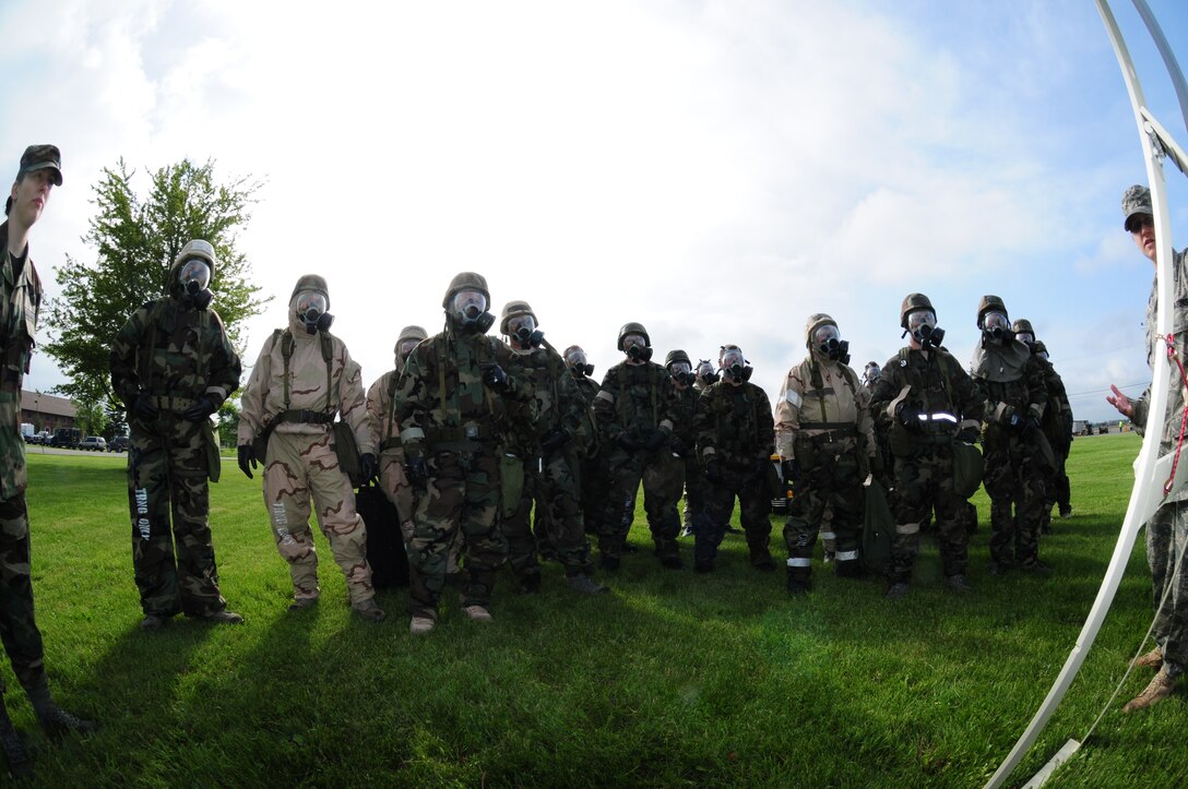 914th Airlift Wing Airmen train in their Mission Oriented Protective Posture suits during the June Unit training assembly June 4 at the Niagara Falls Air Reserve Station, Niagara Falls, NY. Incase of a chemical, biological or nuclear attack, all Airmen are required complete MOPP training in full gear before a deployment to a warzone.