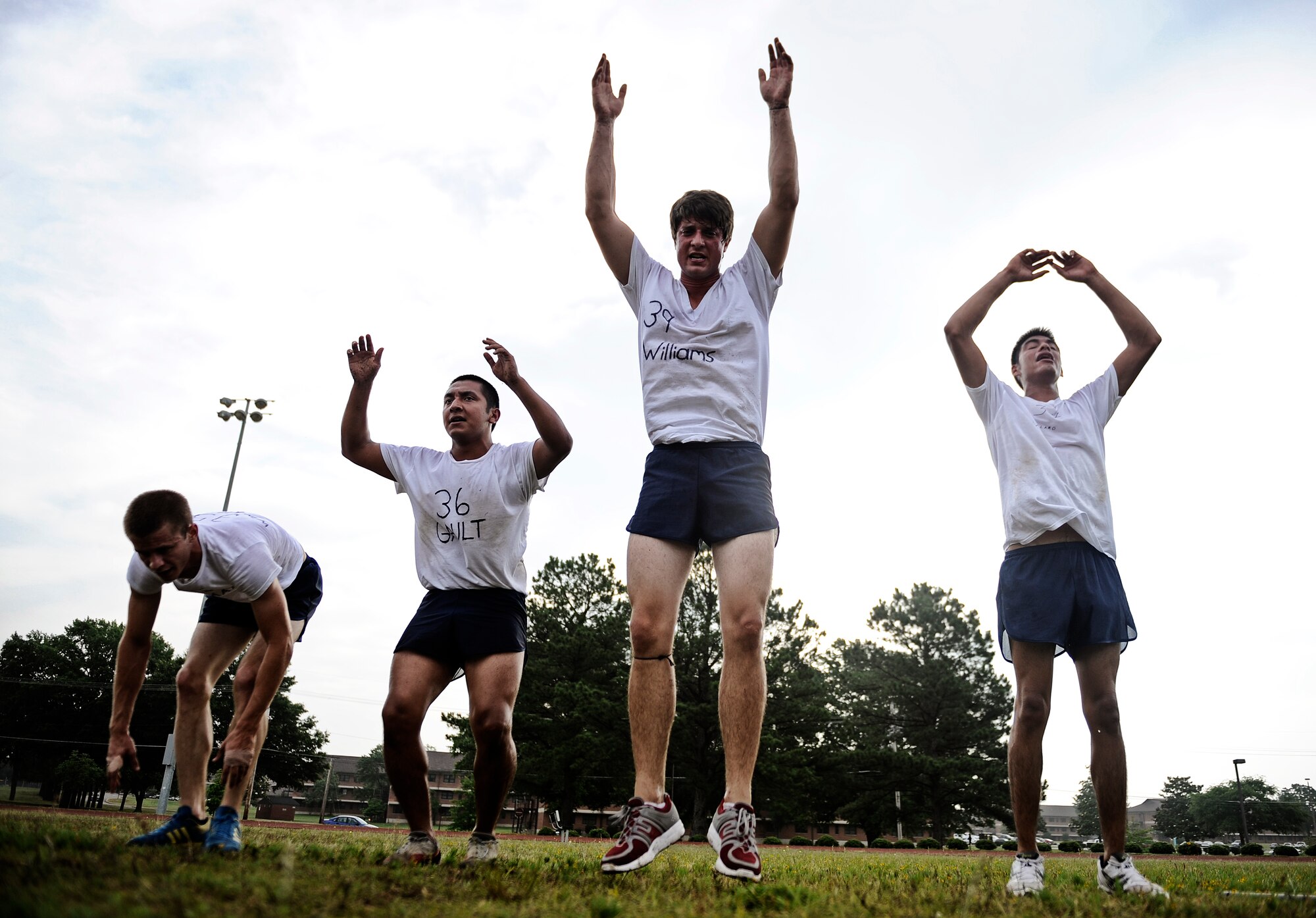 Battlefield Airman trainees perform "burpees" during a team competition June 4, 2010 at Little Rock Air Force Base, AR. Future Airmen, currently in the delayed entry program, were given the opportunity to train with Air Force combat controllers, pararescuemen and various other special operations career fields. The training is designed to better prepare them for the indoctrination course that they will go through for their specific career field. (U.S. Air Force photo/ Senior Airman Ryan Crane)