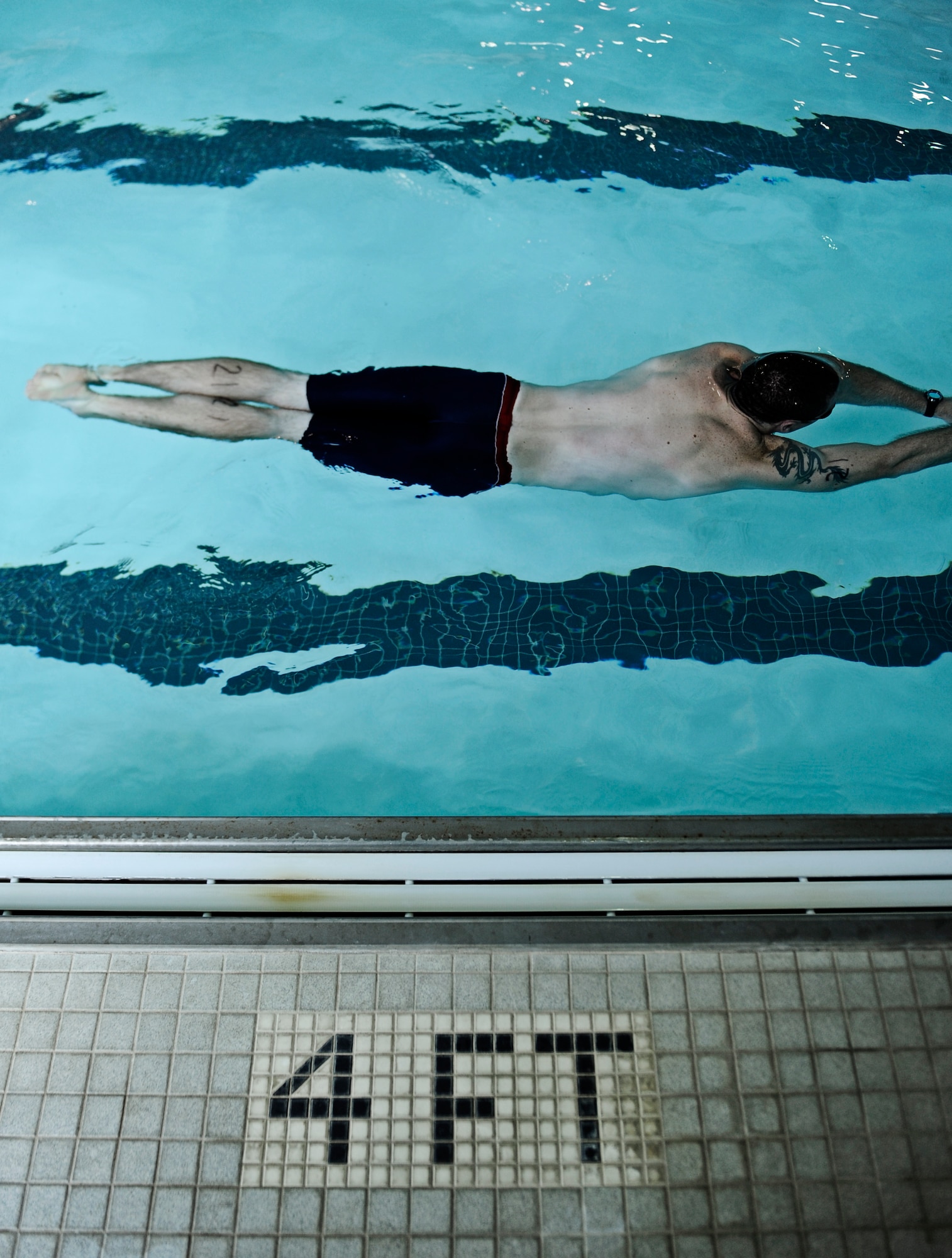 A Battlefield Airman trainee practices the underwater swim portion of the physical ability and stamina test June 3, 2010 at Little Rock Air Force Base, AR. Future Airmen, currently in the delayed entry program, were given the opportunity to train with Air Force combat controllers, pararescuemen and various other special operations career fields. The training is designed to better prepare them for the indoctrination course that they will go through for their specific career field. (U.S. Air Force photo/ Senior Airman Ryan Crane)