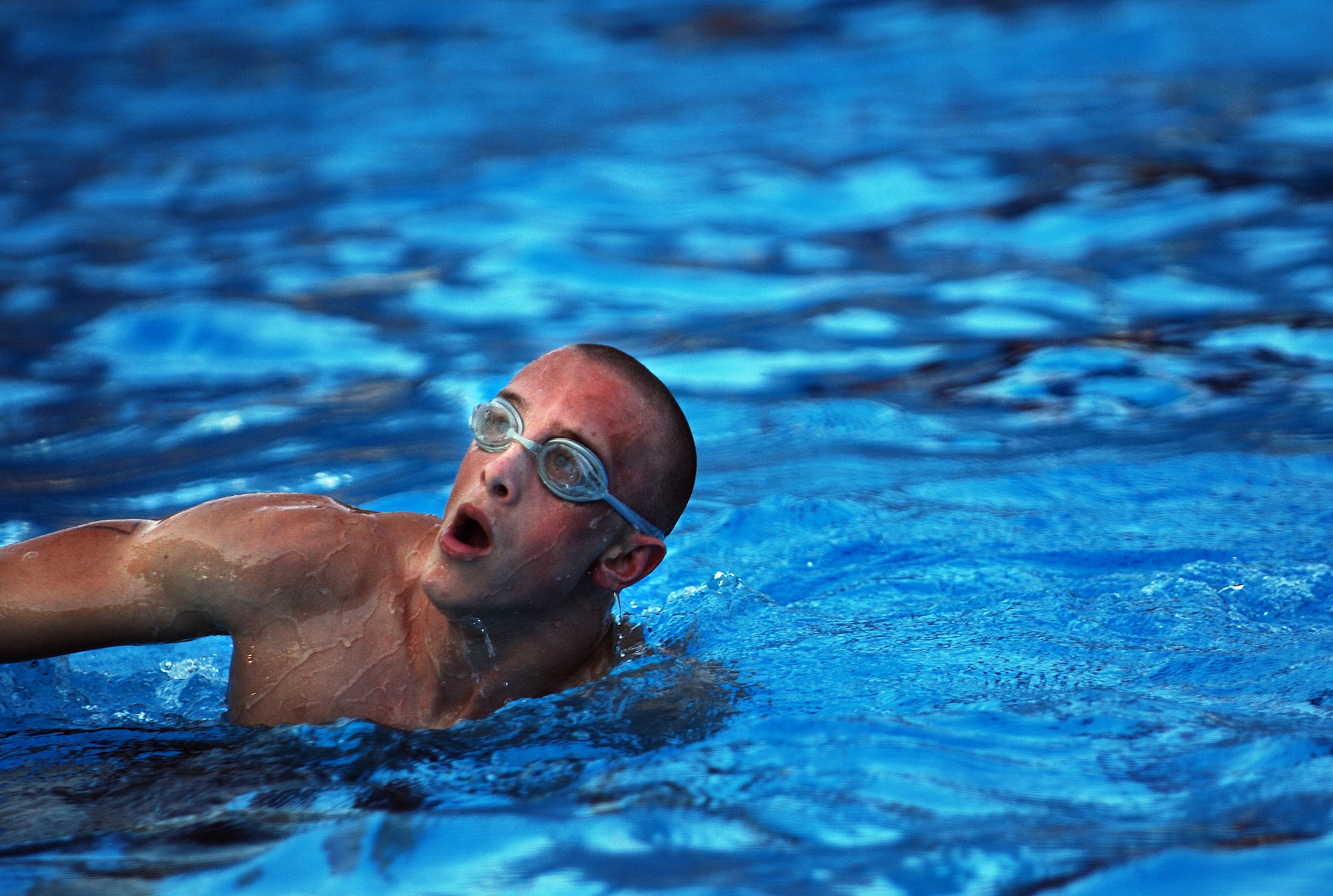 A Battlefield Airman trainee takes a breath while performing the swim portion of his physical ability and stamina test June 2, 2010 at Little Rock Air Force Base, AR. Future Airmen, currently in the delayed entry program, were given the opportunity to train with Air Force combat controllers, pararescuemen and various other special operations career fields. The training is designed to better prepare them for the indoctrination course that they will go through for their specific career field. (U.S. Air Force photo/ Senior Airman Ryan Crane)