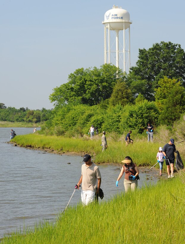 LANGLEY AIR FORCE BASE, Va. – Langley volunteers pick up trash during Langley's annual Clean the Bay Day June 5.  Volunteers collected more than 8,000 pounds of trash during the three-hour clean-up.  (U.S. Air Force photo/Staff Sgt. Barry Loo)
