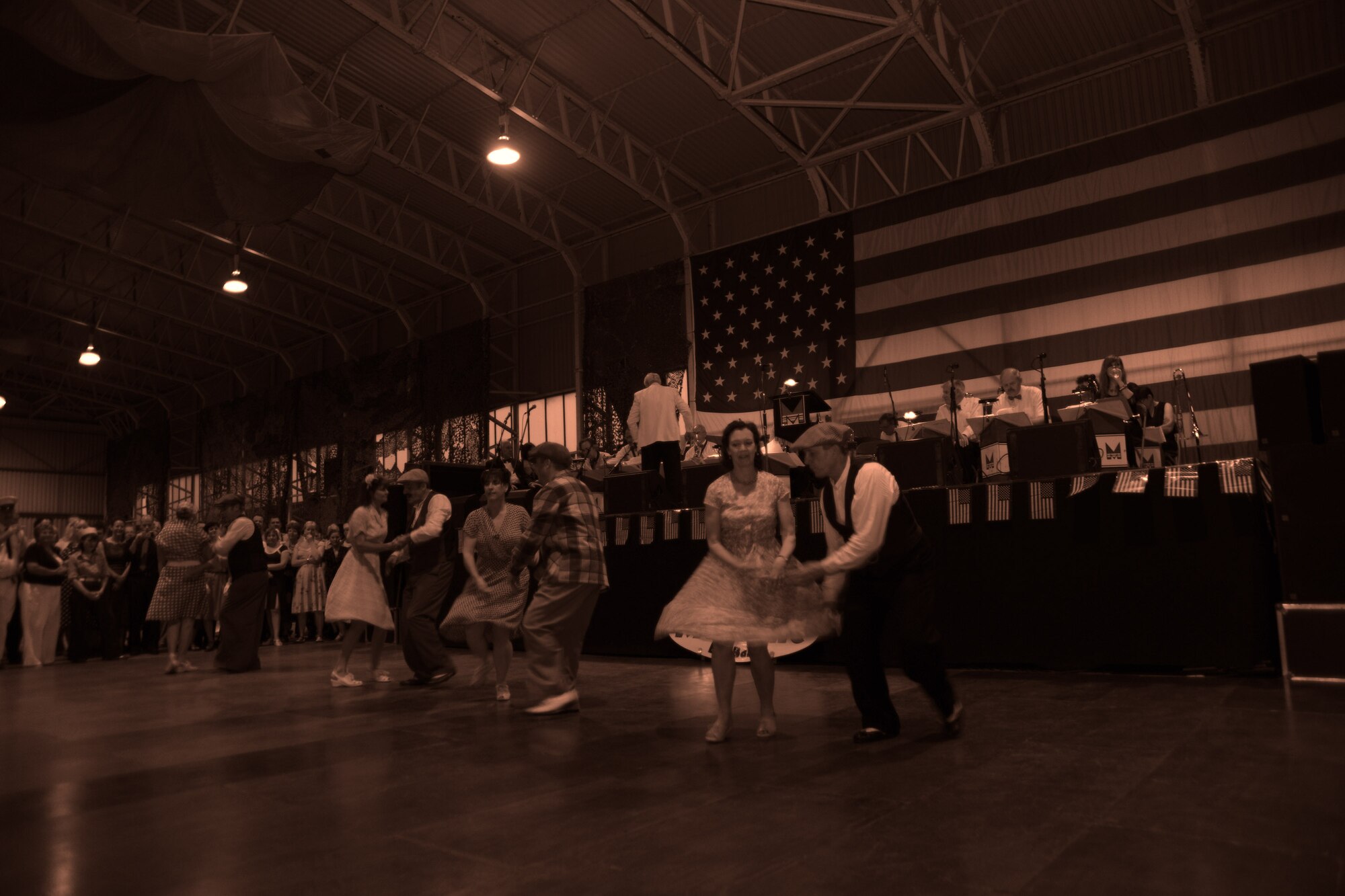 RAF MOLESWORTH, United Kingdom - More than 500 members from local tri-base area and surrounding community attended the annual Hangar Dance here June 5. The dance is based off a 1940's style atmosphere and has been a tradition here since 1988. Veterans from World War II were invited to the dance for free. (U.S. Air Force photo by Staff Sgt. Joel Mease)