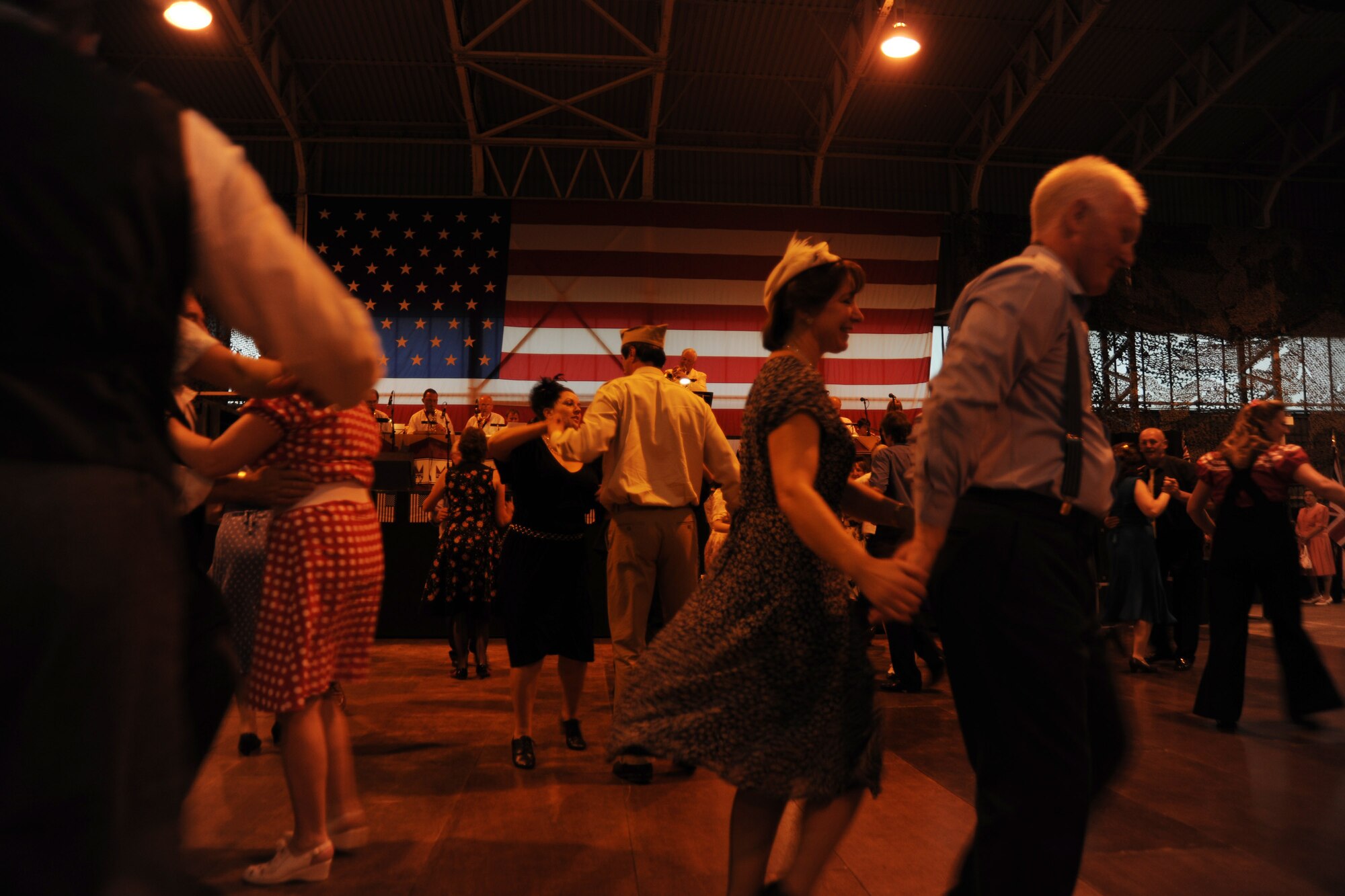 RAF MOLESWORTH, United Kingdom - More than 500 members from local tri-base area and surrounding community attended the annual Hangar Dance here June 5. The dance is based off a 1940's style atmosphere and has been a tradition here since 1988. Veterans from World War II were invited to the dance for free. (U.S. Air Force photo by Staff Sgt. Joel Mease)