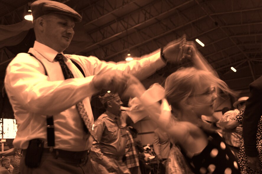RAF MOLESWORTH, United Kingdom - More than 500 members from local tri-base area and surrounding community attended the annual Hangar Dance here June 5. The dance is based off a 1940's style atmosphere and has been a tradition here since 1988. Veterans from World War II were invited to the dance for free. (U.S. Air Force photo by Staff Sgt. Joel Mease)