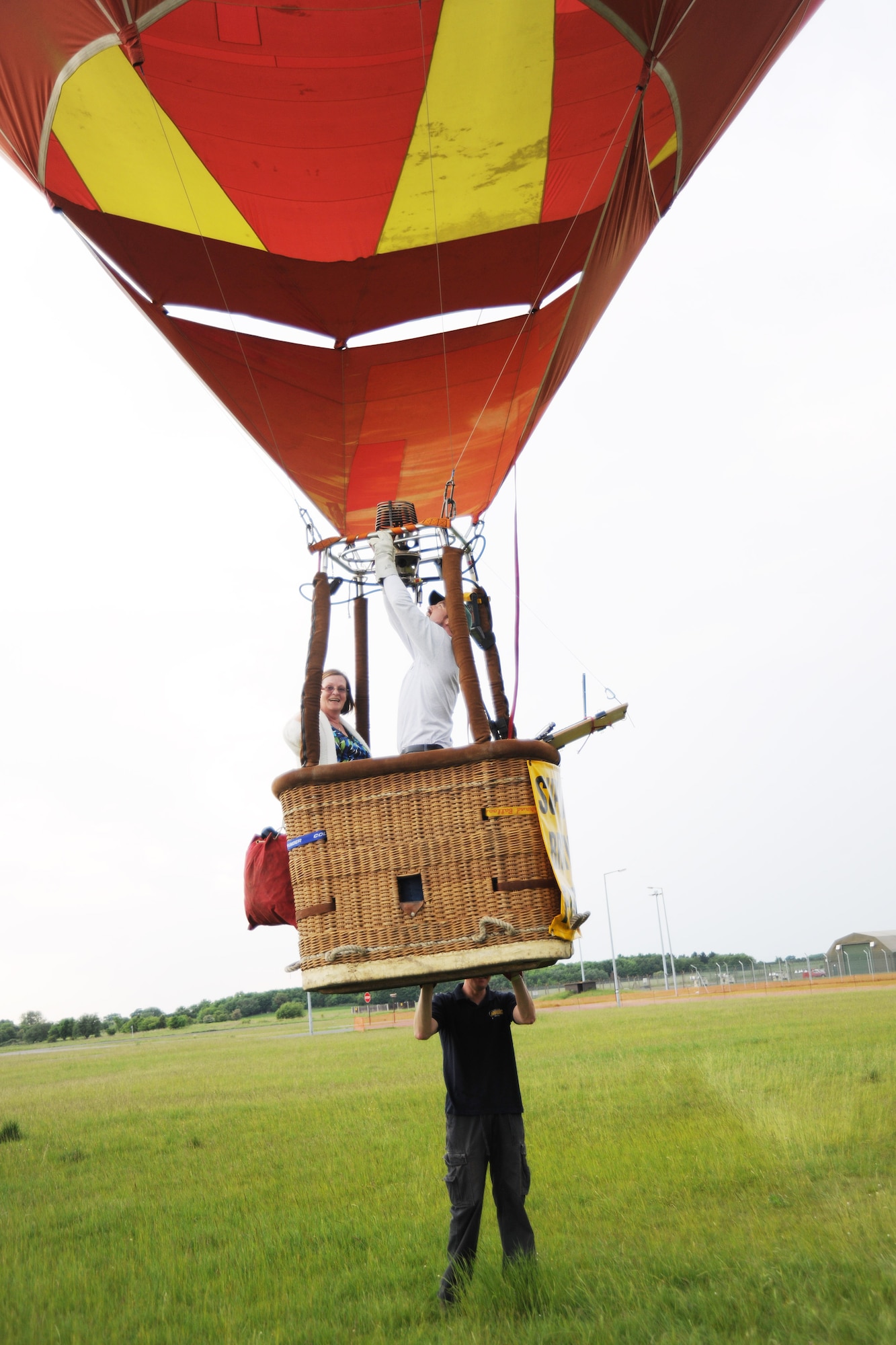 RAF MOLESWORTH, United Kingdom - Members from a local hot air balloon association launch balloons June 5 in conjunction with the Hangar Dance here. (U.S. Air Force photo by Staff Sgt. Joel Mease)