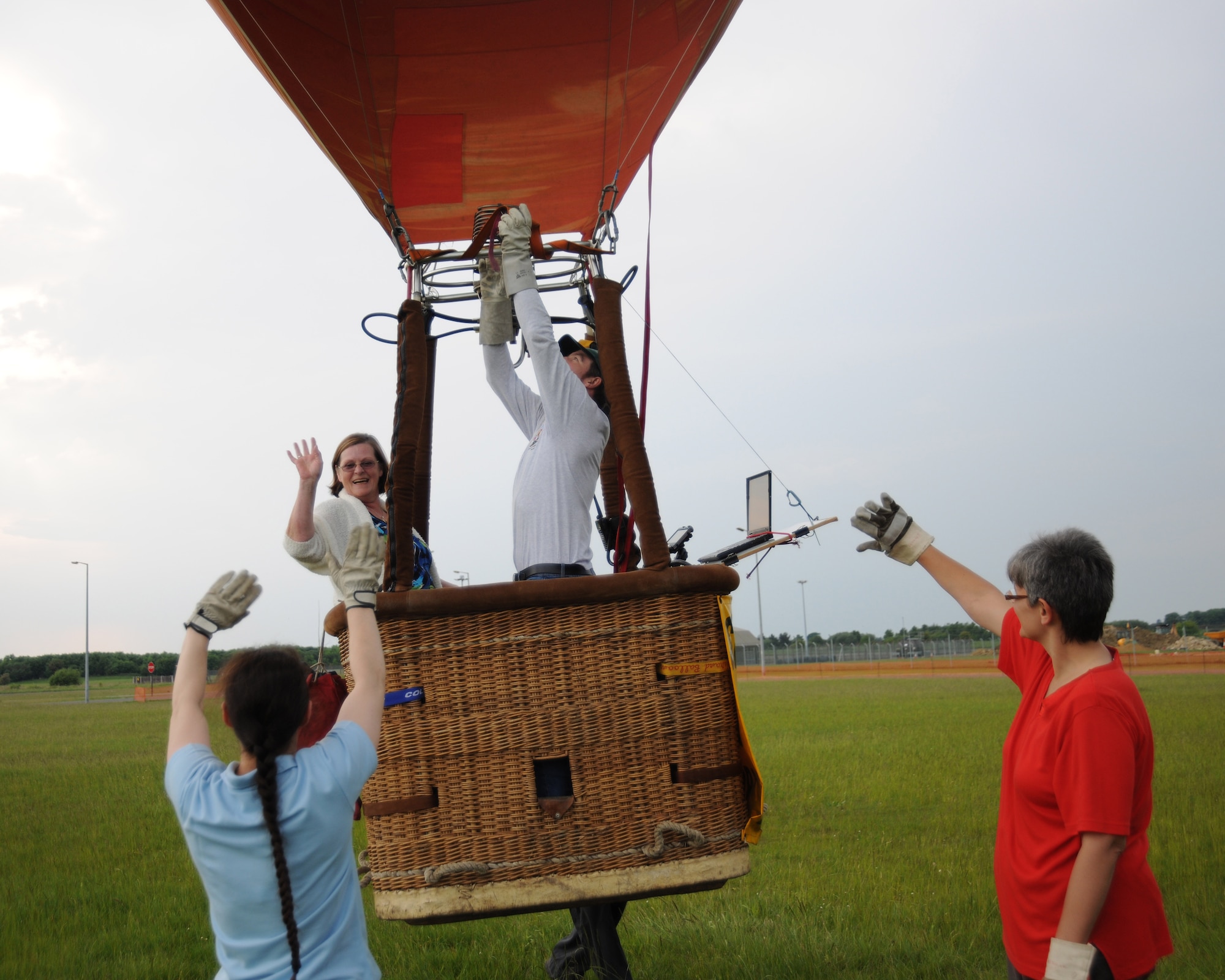 RAF MOLESWORTH, United Kingdom - Members from a local hot air balloon association launch balloons June 5 in conjunction with the Hangar Dance here. (U.S. Air Force photo by Staff Sgt. Joel Mease)