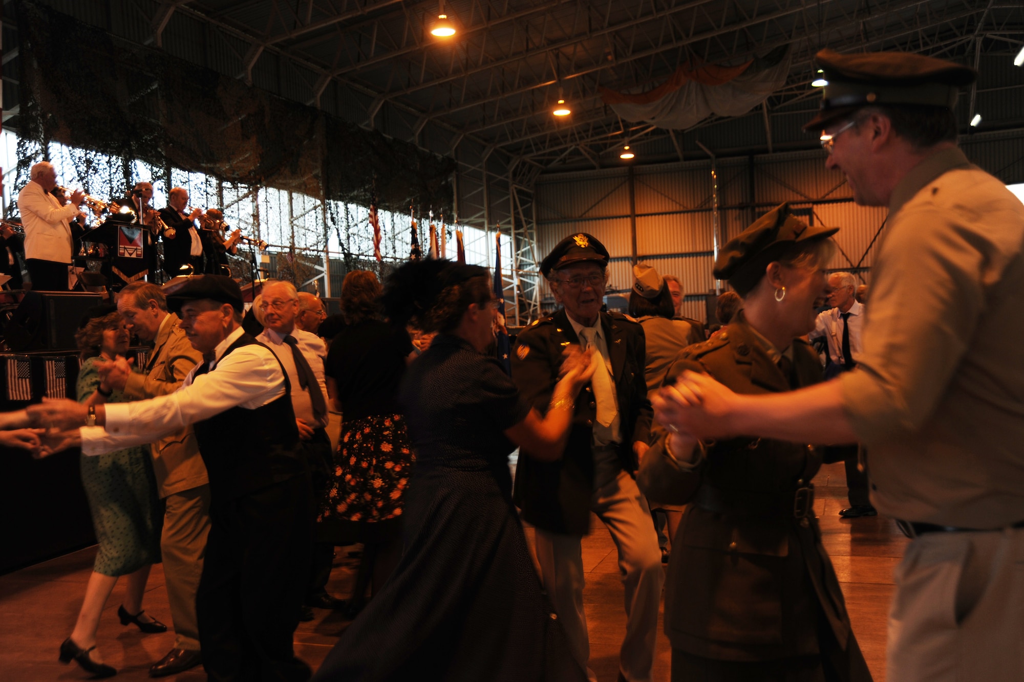 RAF MOLESWORTH, United Kingdom - More than 500 members from local tri-base area and surrounding community attended the annual Hangar Dance here June 5. The dance is based off a 1940's style atmosphere and has been a tradition here since 1988. Veterans from World War II were invited to the dance for free. (U.S. Air Force photo by Staff Sgt. Joel Mease)