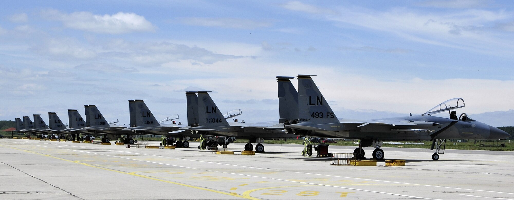 F-15s from the 493rd Fighter Squadron line the flightline. The 'Reapers' are taking part in Anatolian Eagle at the Third Main Jet Base in Konya, Turkey, from June 7 to June 17. The exercise will test their ability to integrate into a large-scale, multi-national team with five countries and NATO. (Photo by Airman 1st Class Tiffany Deuel)