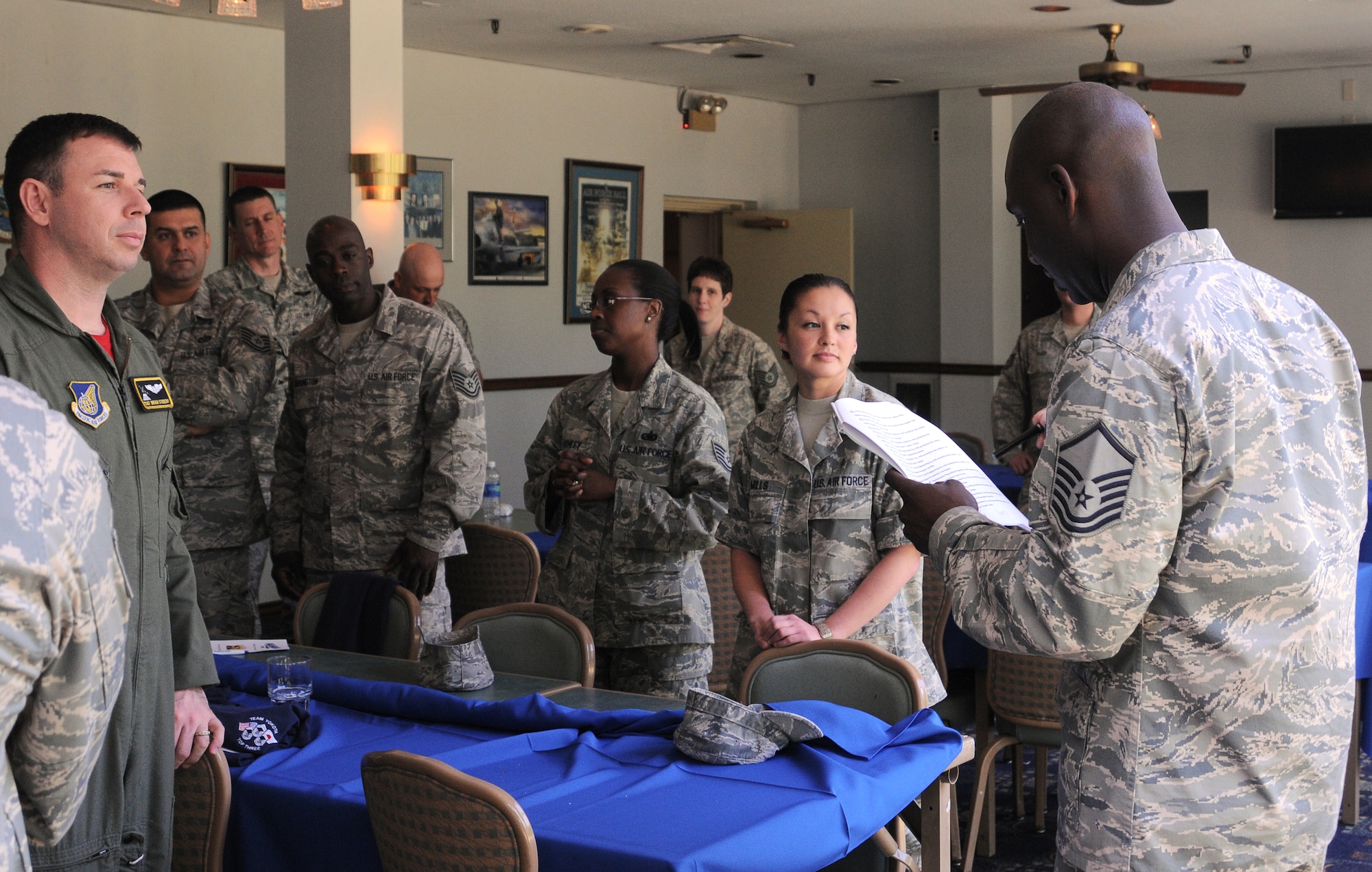 YOKOTA AIR BASE, Japan -- Master Sgt. Quardrick Brumfield, 374th Force Support Squadron Samurai Cafe section chief, calls roll for the newly selected Master Sergeants before a social held at the Enlisted Club here June 4. Forty-one Yokota technical sergeants were among the 5,424 selected May 28 for promotion to master sergeant. (U.S. Air Force Photo/ Airman 1st Class Katrina R. Menchaca)