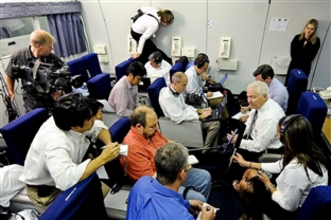 U.S. Defense Secretary Robert M. Gates talks with members of the traveling press on his military aircraft after departing Baku, Azerbaijan, June 7, 2010.