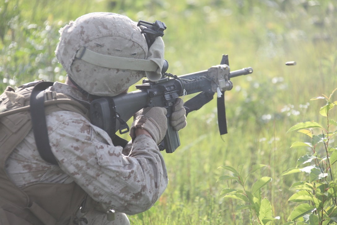 A Marine with Company I, Battalion Landing Team 3/8, 26th Marine Expeditionary Unit, puts rounds downrange during a company battle live-fire exercise as part of Realistic Urban Training aboard Fort A.P. Hill, Va., June 8, 2010. During the 18-day training evolution, the MEU will conduct several urban and other small unit training exercises as part of its pre-deployment training. 26th MEU is scheduled to deploy later this fall.