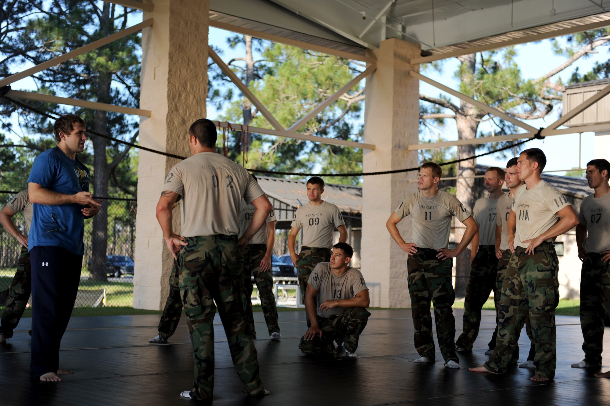 Airmen from the Special Tactics Training Squadron receive a combative class taught by Ultimate Fighting Championship Middleweight Alan Belcher June 8, 2010, at Hurlburt Field, Fla. The training prepared Airmen for hand-to-hand combat in the field. (U.S. Air Force photo/Staff Sgt. Desiree N. Palacios) 