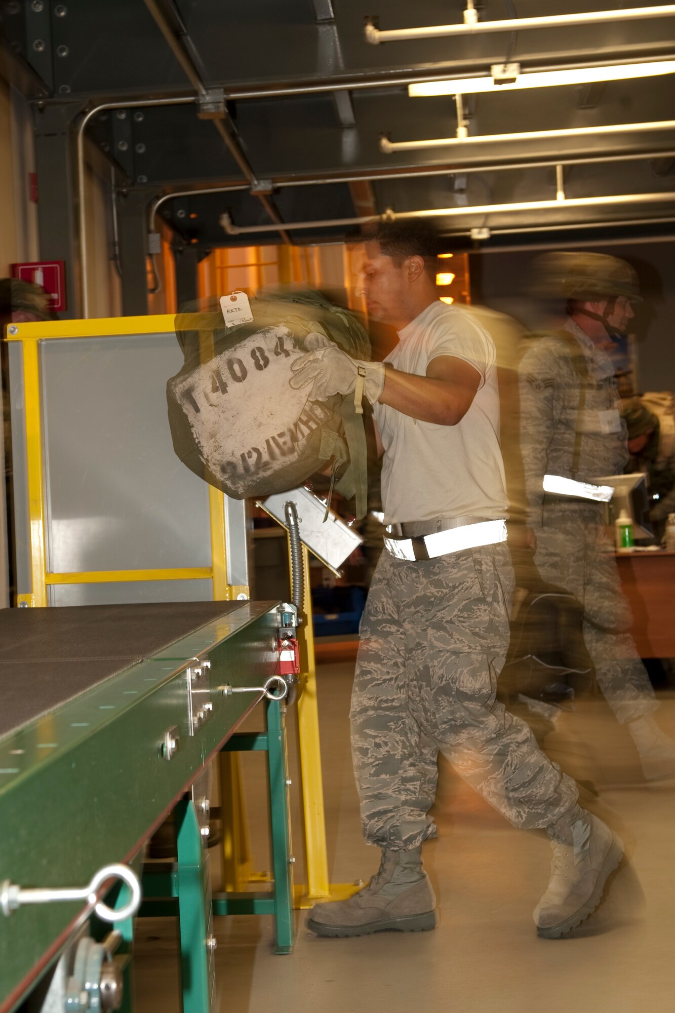 Members of the 144th Fighter Wing process through the mobility line in preperation of a exercise deployment to Kunsan, Korea. The activities took place during Operation Coronet White as part of the 2010 Operational Readiness Inspection at the 144th Fighter Wing in Fresno, California from 04 June through 07 June 2010. (USAF photograph by Tsgt David J. Loeffler)