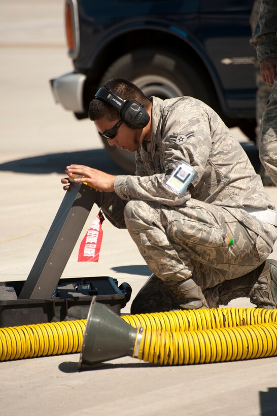 A1C Tafoya Gabriel of the 144th Fighter Wing makes some final preperation prior to the launch of the F-16 Falcon. The activities took place during Operation Coronet White as part of the 2010 Operational Readiness Inspection at the 144th Fighter Wing in Fresno, California from 04 June through 07 June 2010. (USAF photograph by Tsgt David J. Loeffler)