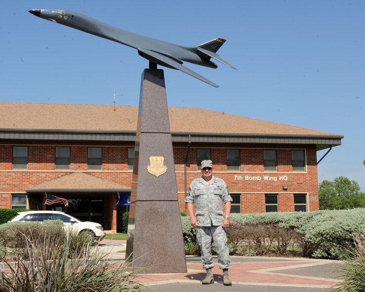 DYESS AIR FORCE BASE, Texas -  Command Chief Master Sgt. David Goldie, 7th Bomb Wing command chief master sergeant, stands outside the 7th Bomb Wing Headquarters building June 9 here. Chief Goldie will be retiring June 11 after 29 years of service. (U.S. Air Force Photo by/Airman 1st Class Chelsea Cummings)