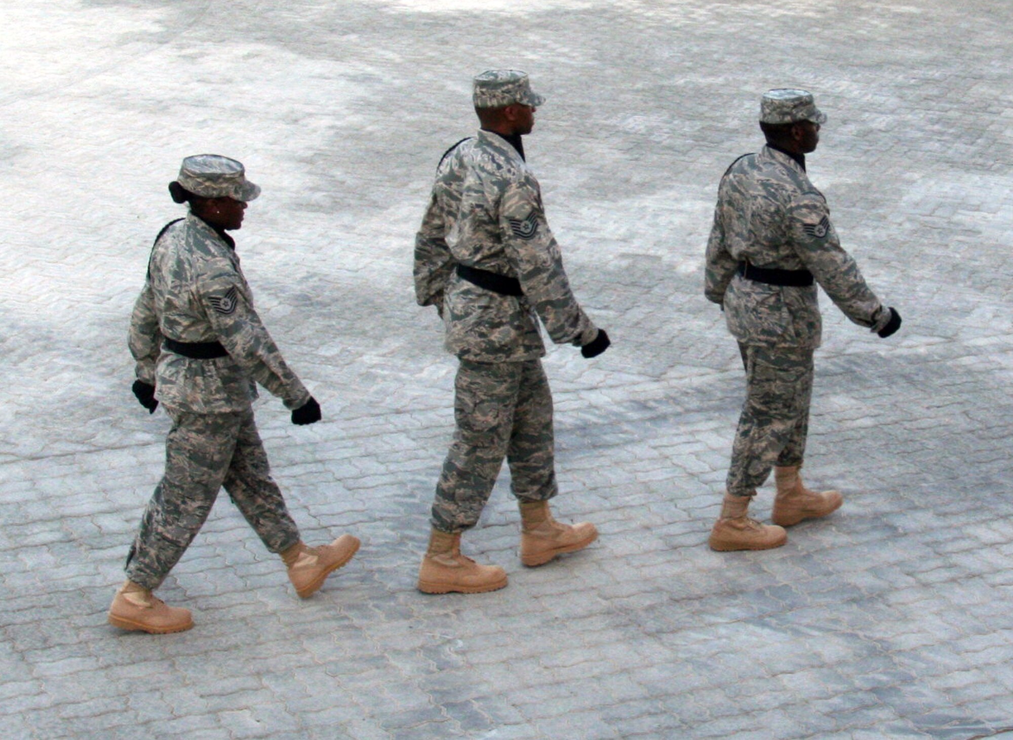 Airmen from the 380th Air Expeditionary Wing Honor Guard participate in a wing retreat ceremony on May 28, 2010, at a non-disclosed base in Southwest Asia. Every week the 380th AEW holds a retreat ceremony honoring the American flag as part of a continuing military tradition. On May 28, the 380th Expeditionary Medical Group served as the lead unit for the retreat. The 380th AEW supports operations Iraqi Freedom and Enduring Freedom and the Combined Joint Task Force-Horn of Africa. (U.S. Air Force Photo/Master Sgt. Scott T. Sturkol/Released)