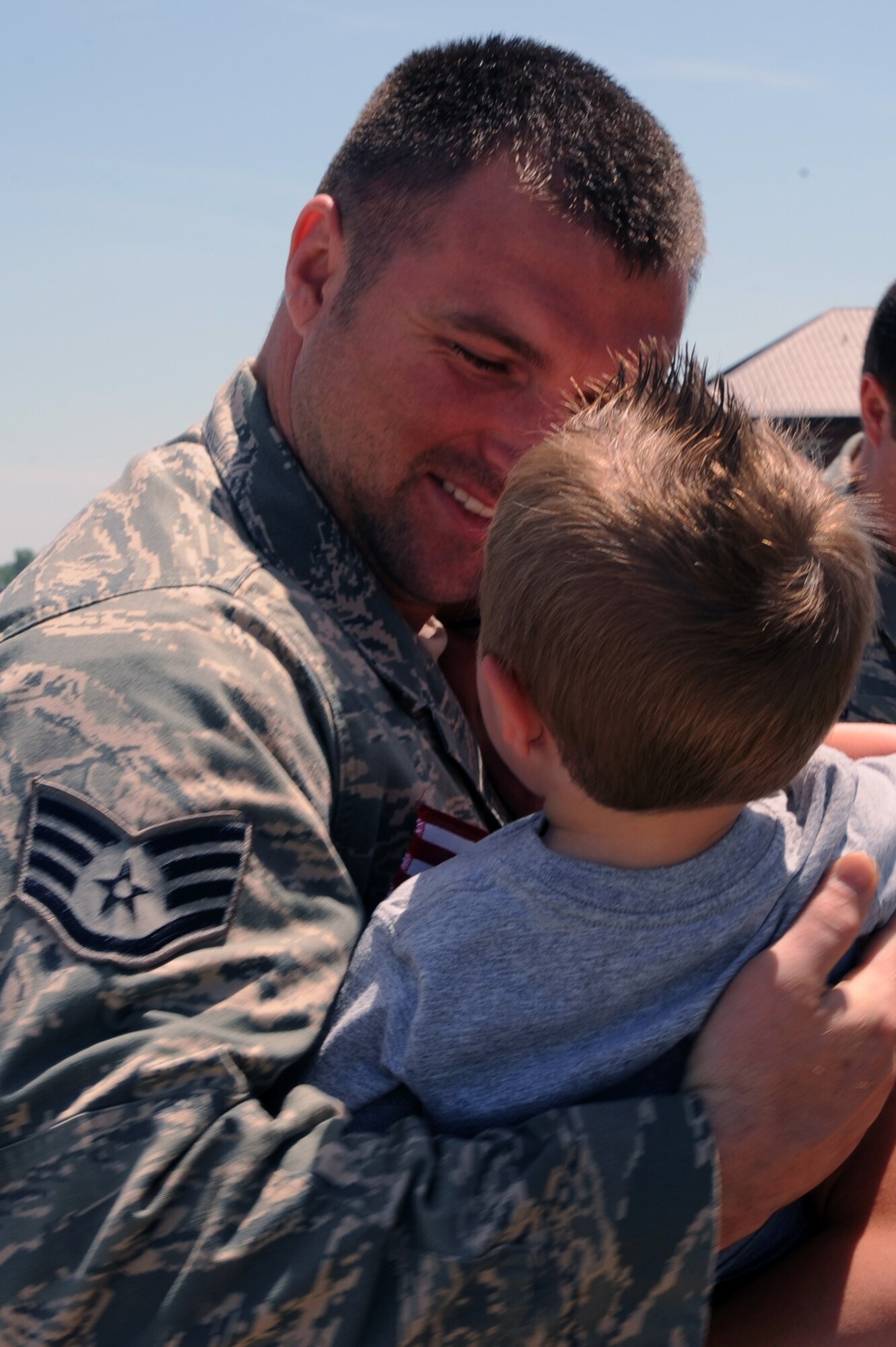 WHITEMAN AIR FORCE BASE, Mo., -- Staff Sgt. Walter Coston, 509th Aircraft Maintenance Squadron, hugs his son CJ, June 4, upon returning home from his four-month deployment to Andersen Air Force Base, Guam. More than 200 Airmen deployed in support of the B-2 Spirit's continuing bomber presence in the Pacific.
(U.S. Air Force photo/Staff Sgt. Jason Huddleston)

