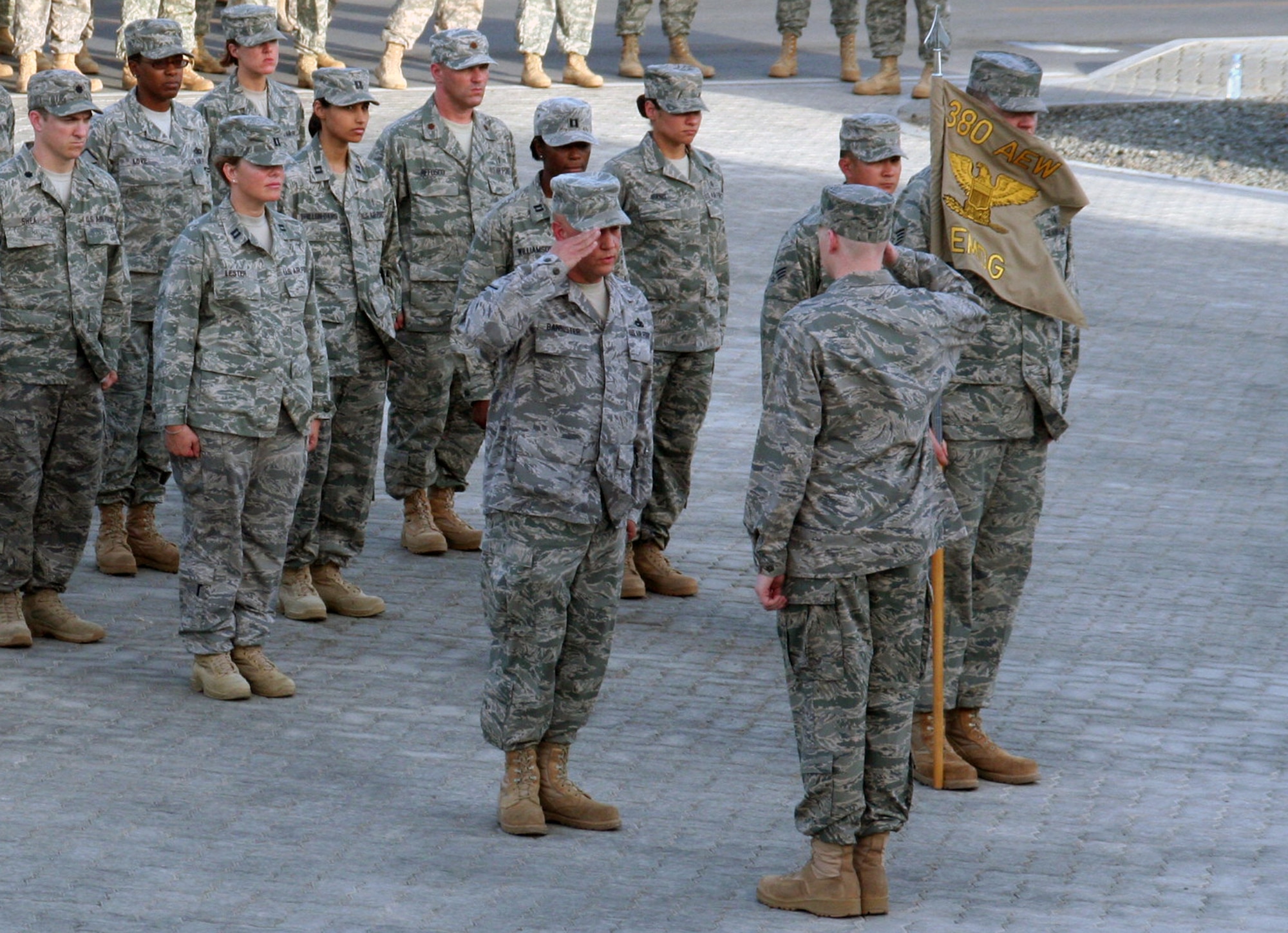 Airmen from the 380th Air Expeditionary Wing participate in a wing retreat ceremony on May 28, 2010, at a non-disclosed base in Southwest Asia. Every week the 380th AEW holds a retreat ceremony honoring the American flag as part of a continuing military tradition. On May 28, the 380th Expeditionary Medical Group served as the lead unit for the retreat. The 380th AEW supports operations Iraqi Freedom and Enduring Freedom and the Combined Joint Task Force-Horn of Africa. (U.S. Air Force Photo/Master Sgt. Scott T. Sturkol/Released)