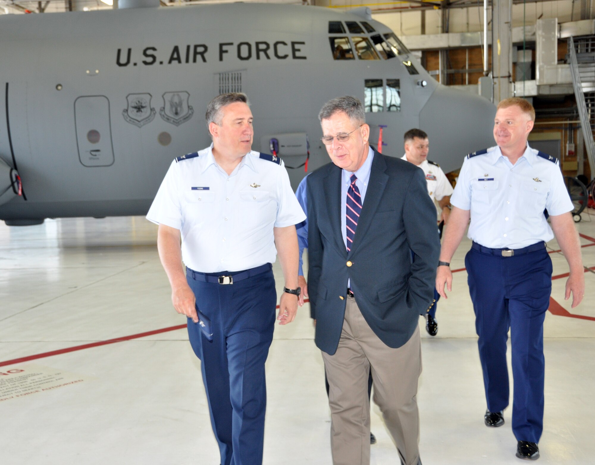 Col. Darrell G. Young, 934th Airlift Wing commander, talks with Assistant Secretary of Defense for Reserve Affairs Dennis McCarthy, June 7 after receiving a briefing by Col. Ron Wilt, (right) 934th Operations Group commander.  Secretary McCarthy stopped at the 934th before speaking at the Minnesota Employer Support of the Guard and Reserve banquet later that night. (Air Force Photo/Master Sgt. Paul Zadach)