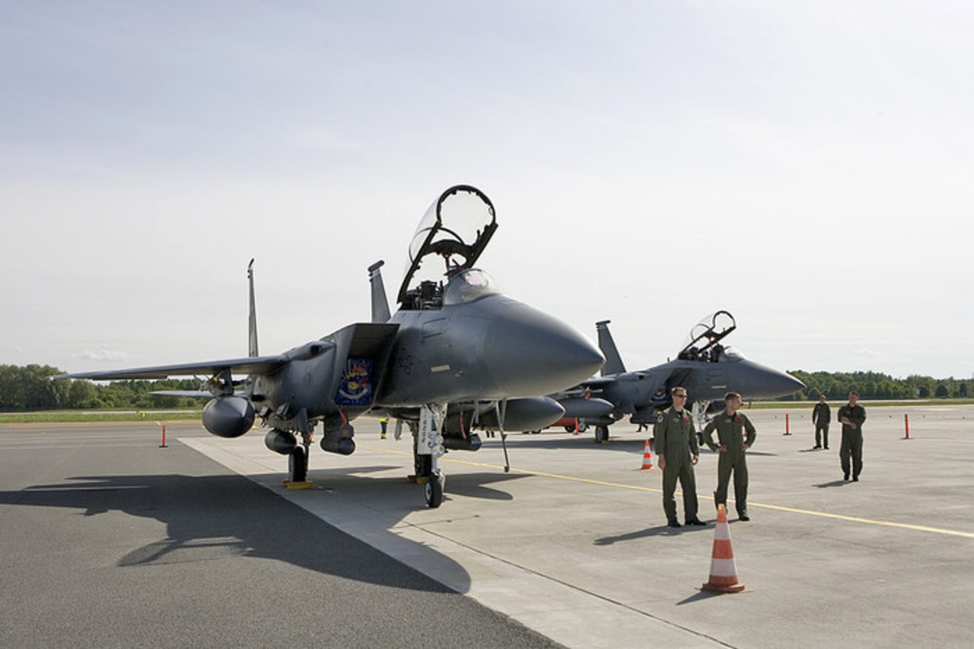 F-15E Strike Eagles sit on the ramp at the Tallinn airport following a combined exercise between USAFE aircraft and Estonian joint terminal attack controllers prior to the start of Unified Engagement 2010, June 7, 2010 in Tallinn, Estonia. U.S. Air Forces in Europe officials joined representatives from seven other countries to participate in the Unified Engagement seminar, which continues through June 11, 2010. The seminar is the fourth Building Partnership Seminar USAFE officials have conducted with European partners as a transformation war game to explore future combined warfighting concepts and capabilities. The F-15s are from Royal Air Force Lakenheath, England. (Photo courtesy of Estonian Defense Force Public Affairs)
