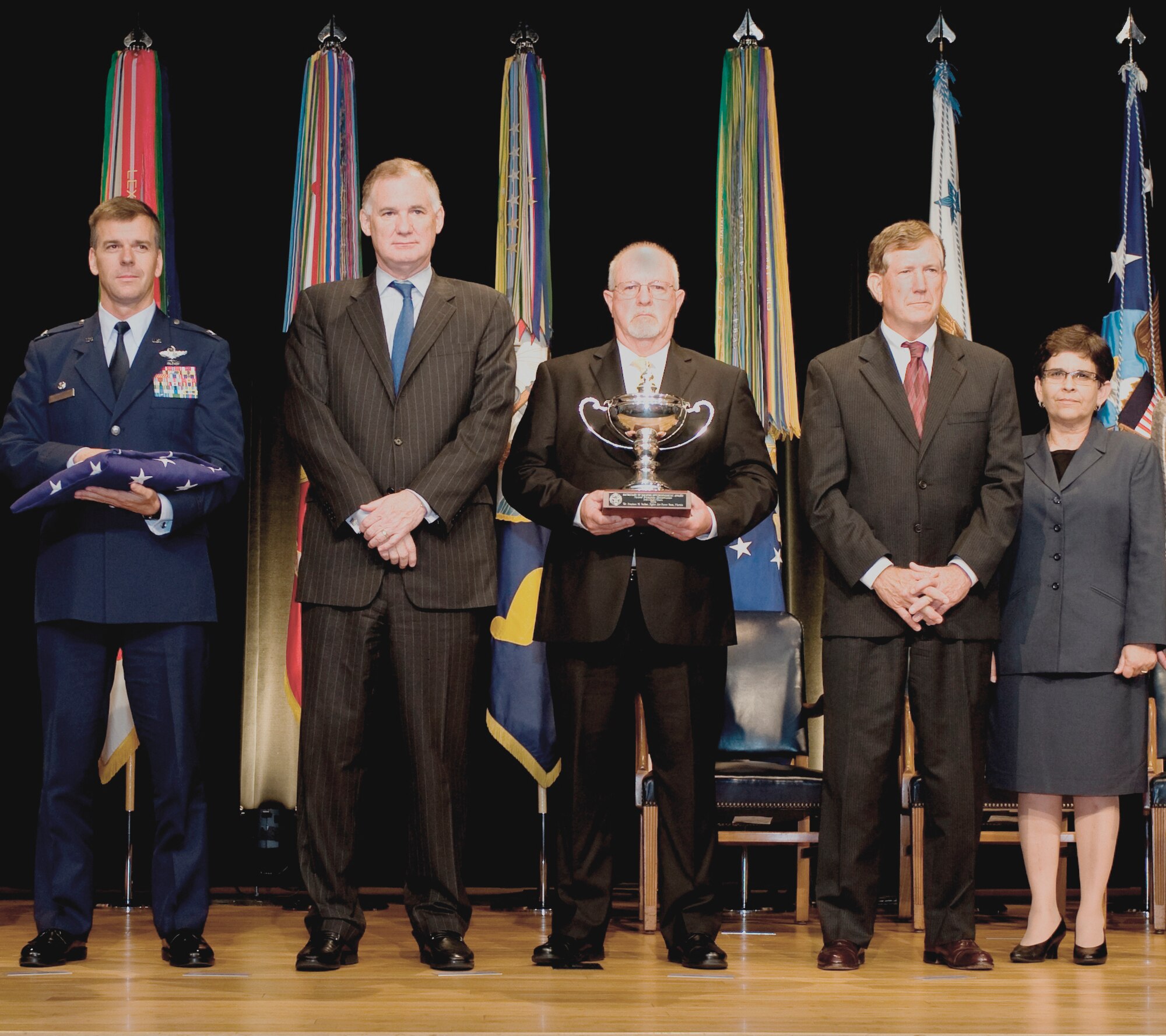 Eglin leaders accept the Secretary of Defense Natural Resources Management Award Jun. 2 at the Pentagon for their outstanding achievements to conserve and sustain natural and cultural resources entrusted to the DoD. From left to right: Col. Bruce McClintock, 96th Air Base Wing commander, stood in attendance as The Honorable William J. Lynn III, Deputy Secretary of Defense presented Steve Seiber, chief, Eglin Natural Resources section with a trophy. Also pictured here are The Honorable Terry A.Yonkers, Assistant Secretary of the Air Force for Installations, Environment and Logistics and Maria Rodriguez, Eglin Stewardship Branch chief. Other persons in attendance were Randall Rowland,chief, Eglin Environmental Management Division;The Honorable Aston B.Carter, Undersecretary of Defense for Acquisition, Technology, and Logistics and Sherri Goodman, General Council, CNA Corporation. See the full story at www.eglin.af.mil. (Courtesy Photo)