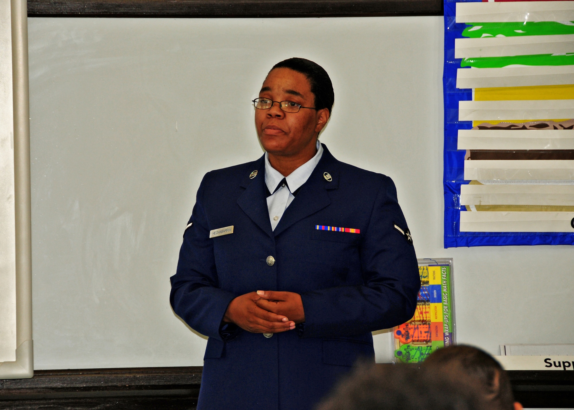 Rising Six member Airman Maria Hechabarria of the 914th Airlift Wing tells students of the Buffalo School of Technology about basic military training, June 8, 2010, Buffalo NY. As part of their community involvement members of the Rising Six talk to students on how the Air Force has made a positive change in their life. (U.S. Air Force photo by Staff Sgt. Joseph McKee)
