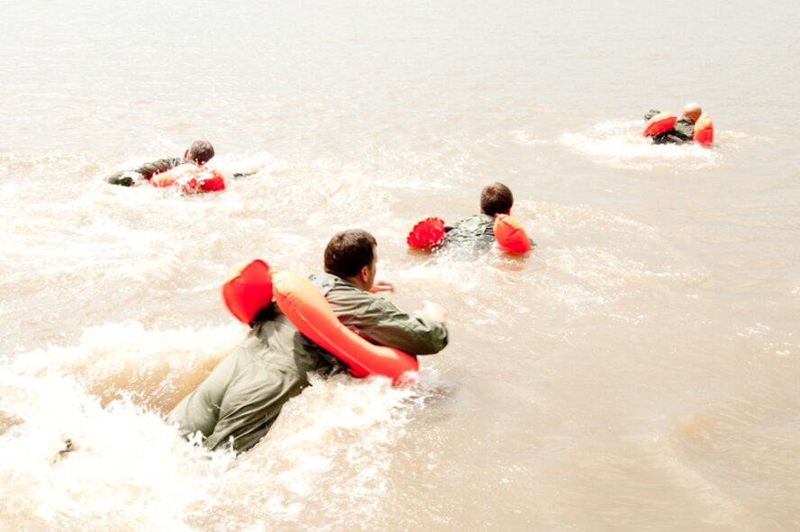 The 180th Airlift Squadron, 139th Airlift Wing, in St. Joseph, Mo. conducts survival training for it's flight crews in Northern Mo., June 5th, 2010. (U.S. Air Force photo by Master Sgt. Shannon Bond/Released)