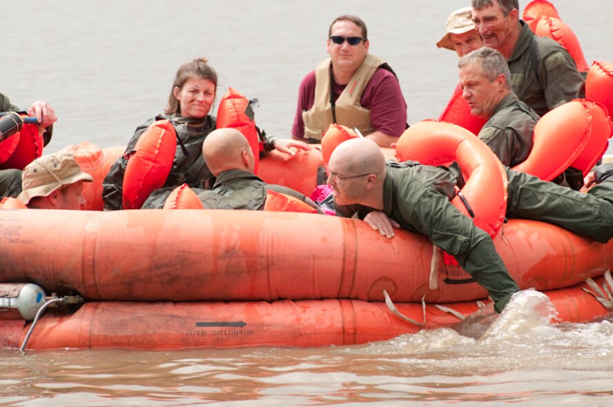 The 180th Airlift Squadron, 139th Airlift Wing, in St. Joseph, Mo. conducts survival training for it's flight crews in Northern Mo., June 5th, 2010. (U.S. Air Force photo by Master Sgt. Shannon Bond/Released)