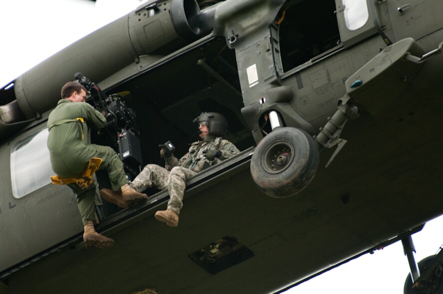 The Mo. National Guard assists the 180th Airlift Squadron, 139th Airlift Wing, St. Joseph, Mo. with a Blackhawk crew and helicopter as they conduct survival training for it's flight crews in Northern Mo., June 5th, 2010. (U.S. Air Force photo by Master Sgt. Shannon Bond/Released)