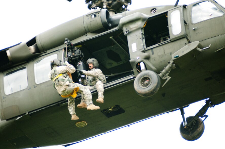 The Mo. National Guard assists the 180th Airlift Squadron, 139th Airlift Wing, St. Joseph, Mo. with a Blackhawk crew and helicopter as they conduct survival training for it's flight crews in Northern Mo., June 5th, 2010. (U.S. Air Force photo by Master Sgt. Shannon Bond/Released)