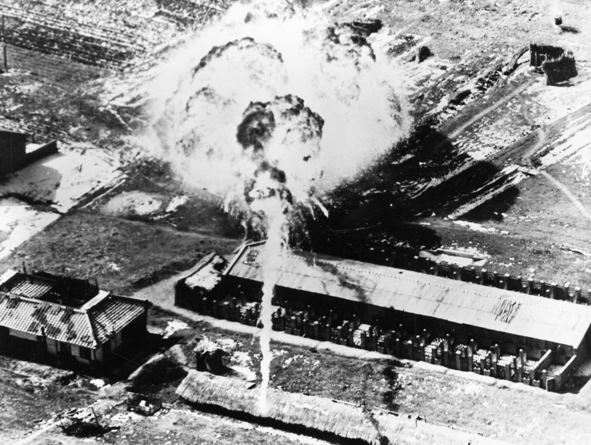 Napalm fireball about to engulf a communist supply building in March 1951. (U.S. Air Force photo)