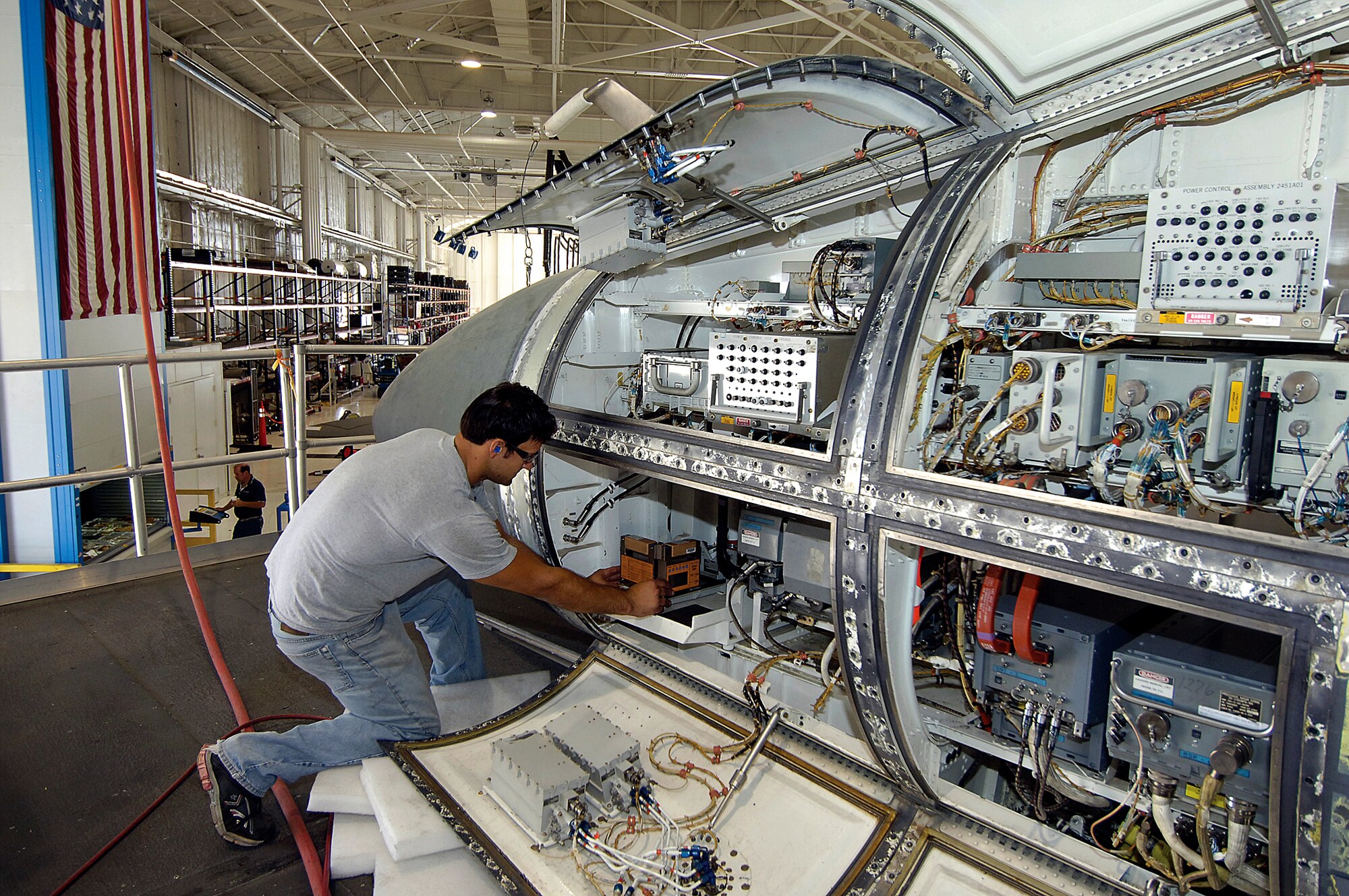 Trevor Aldridge helps prepare a B-1 Lancer for a modification during maintenance June 4, 2010, at Tinker Air Force Base, Okla. (U.S. Air Force photo/Margo Wright)