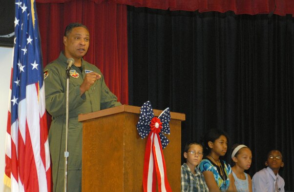 Maj. Gen. Garry C. Dean, 1st Air Force commander, illustrates a point during his speech to Tyndall Elementary School 5th graders at their 2010 Recognition Ceremony.  Pictured to the right are Brandon Oncale, Adora Walker, Ashley Kennedy and Diy’Quon Roulhac.