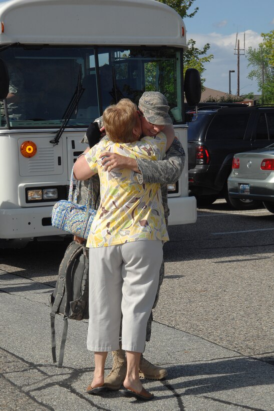 GRISSOM AIR RESERVE BASE, Ind. -- Staff Sgt. Alexander Harris, a fire team member with the 434th Security Forces Squadron, is greeted by a family member as he returns home from a six-month deployment to Kirkuk, Iraq.  (U.S. Air Force photo/Tech. Sgt. Douglas Hays)