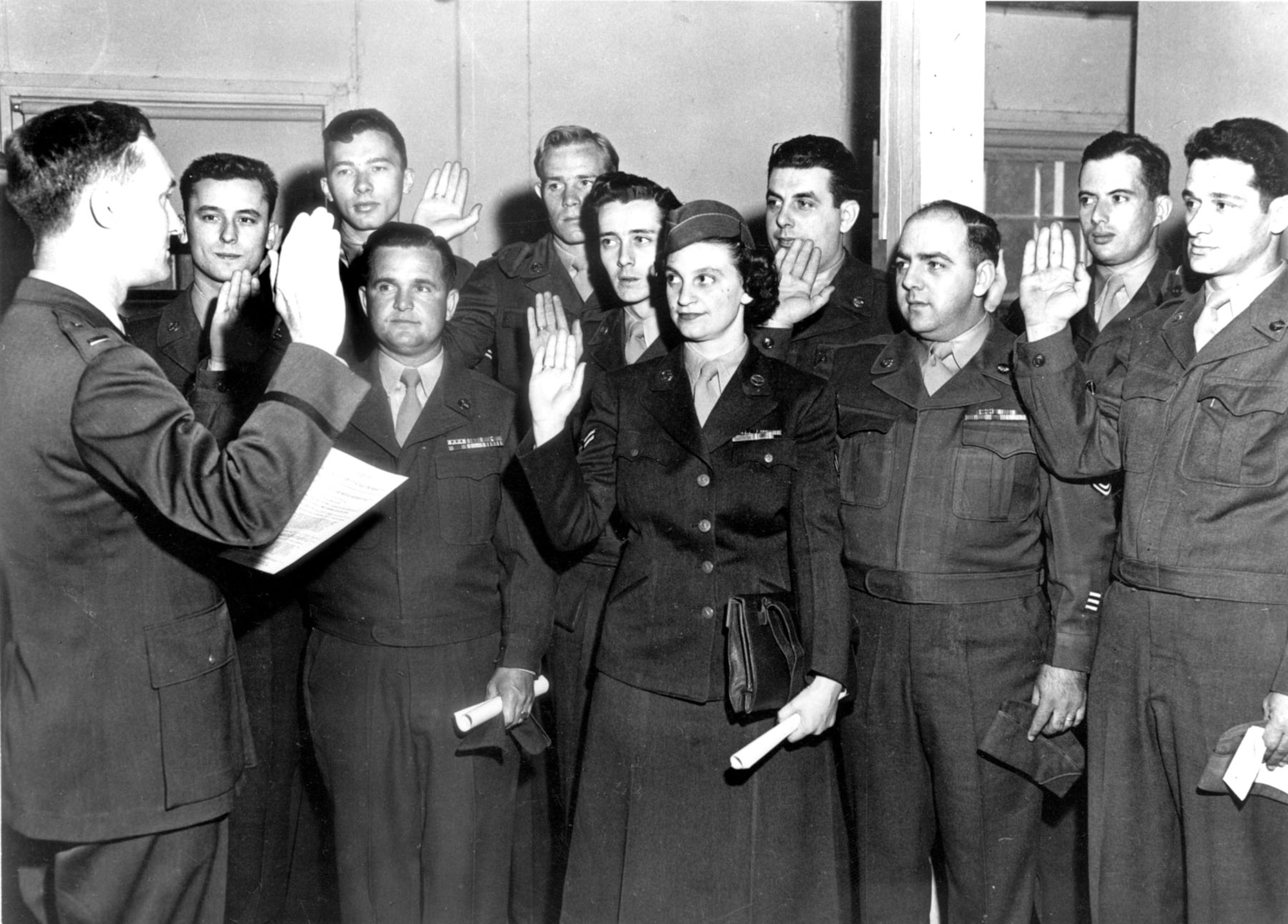 Air Force Reserve members re-affirm their oaths of service at Mitchel Air Force Base, N.Y., 1951. (U.S. Air Force photo)