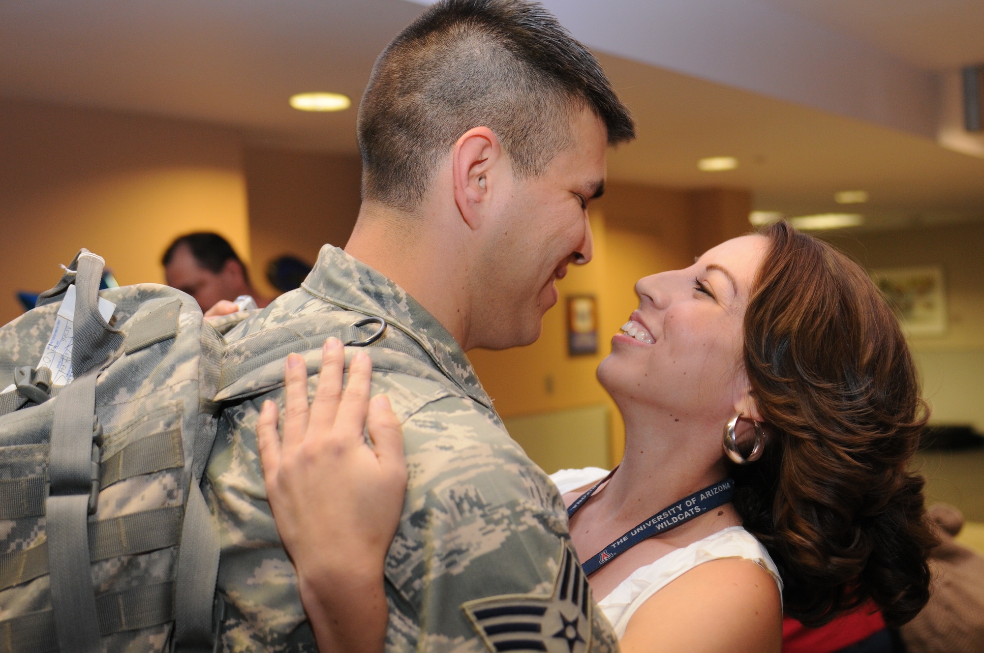 Senior Airman Francisco Rodriguez is welcomed home after a five-month deployment to Iraq, June 6. Family and friends celebrated the return of 29 security forces Airmen assigned to the 162nd Fighter Wing at Tucson International Airport. (Air Force photo by Maj. Gabe Johnson) 