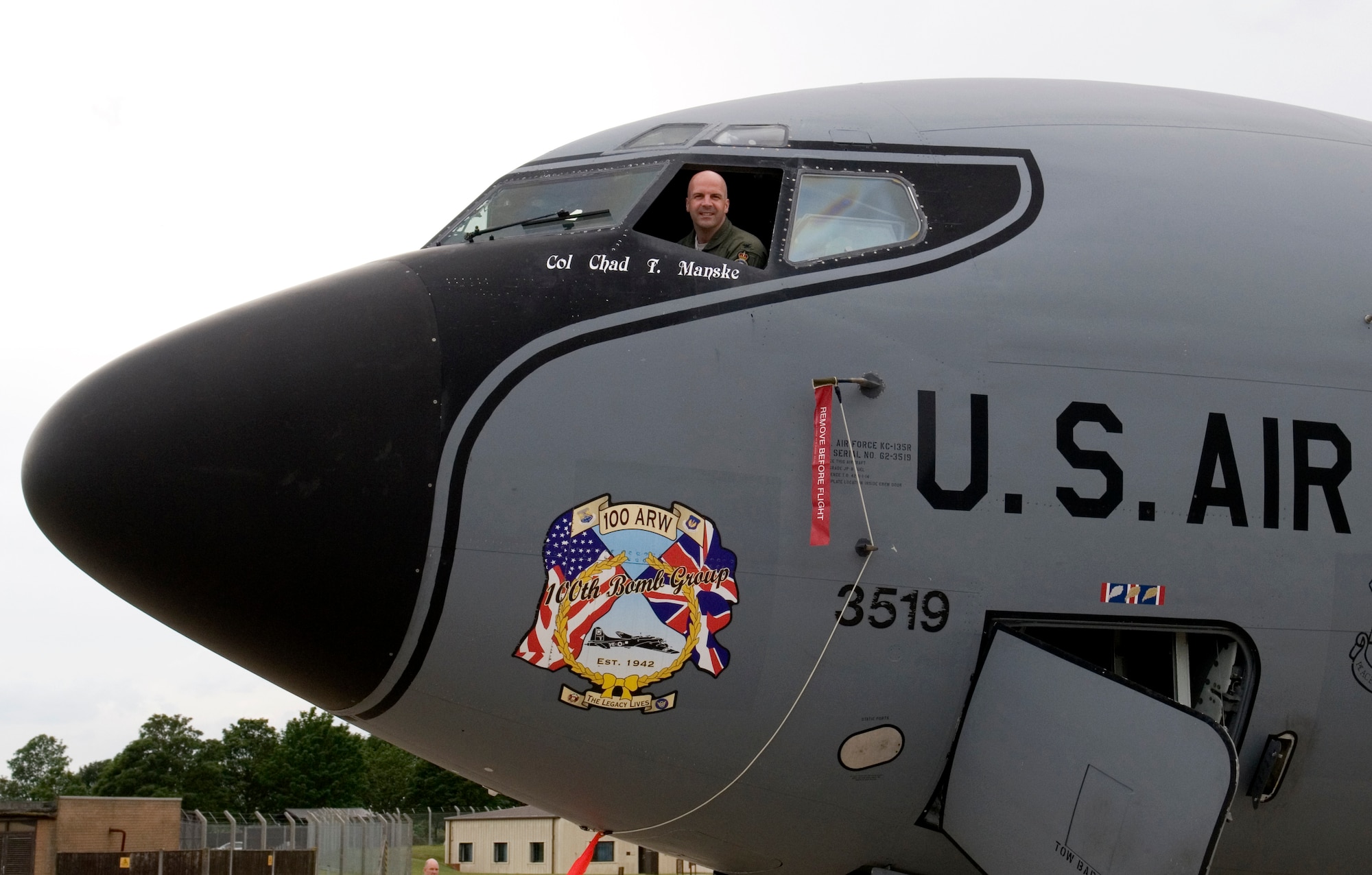 RAF MILDENHALL, England – Col. Chad Manske, 100th Air Refueling Wing commander, takes a photo of his newly appointed flagship aircraft 62-3519 after his name is unveiled during the farewell ceremony June 7.  (U.S. Air Force photo/ Staff Sgt. Jerry Fleshman)