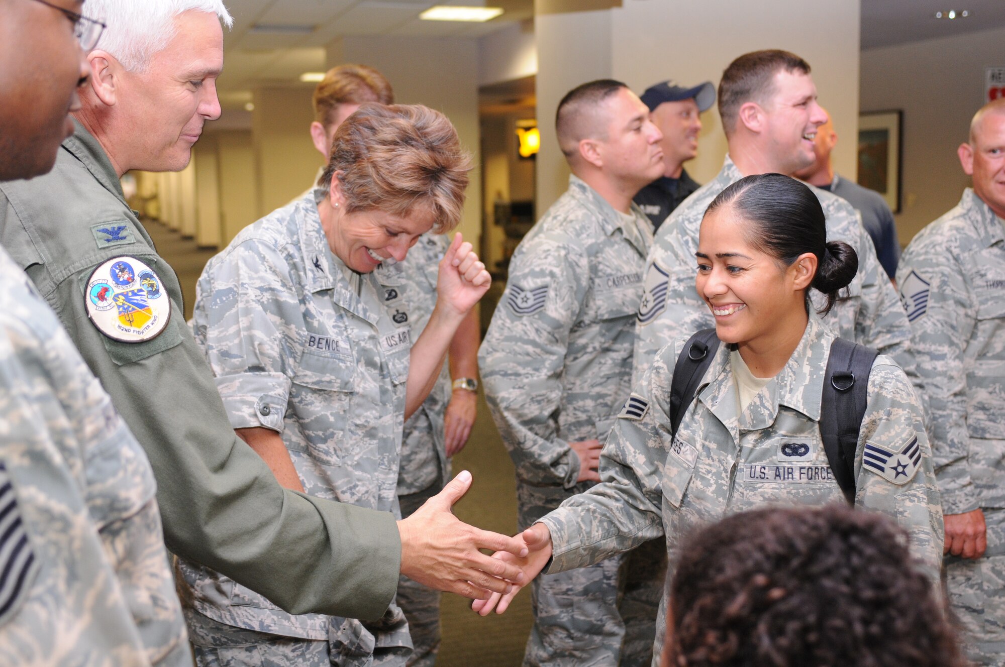 Senior Airman Leticia Torres is welcomed home after a five-month deployment to Iraq, June 6. Family and friends celebrated the return of 29 security forces Airmen assigned to the 162nd Fighter Wing at Tucson International Airport. (Air Force photo by Maj. Gabe Johnson)