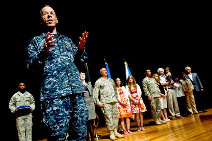 Navy Adm. Mike Mullen, chairman of the Joint Chiefs of Staff, addresses audience members at an award ceremony recognizing three Airmen with Bronze Stars for their tours of duty in Afghanistan during an all hands call at Joint Base Charleston, S.C., June 3, 2010. (DoD photo/Mass Communication Specialist Chad J. McNeeley/Released)