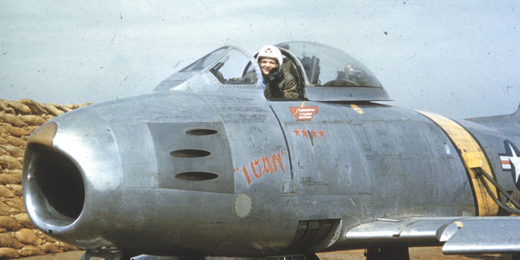 Capt. Iven C. Kincheloe Jr. in the cockpit of "Ivan," the F-86E he flew in combat in Korea. (U.S. Air Force photo)
