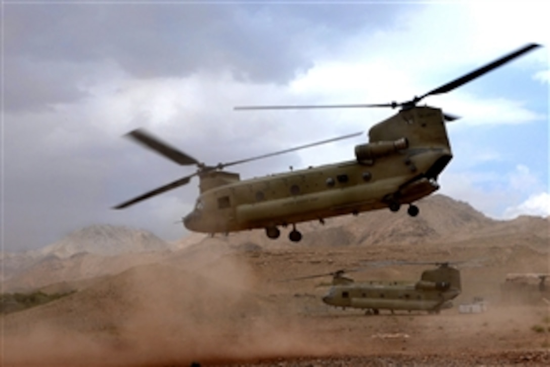 A U.S. Army CH-47 Chinook helicopter takes off after dropping supplies to soldiers at Forward Operating Base Baylough in the Zabul province, Afghanistan, June 7, 2010. The soldiers are assigned to Company D, 1st Battalion, 4th Infantry Regiment, and the helicopter crew is assigned to the 101st Airborne Division.