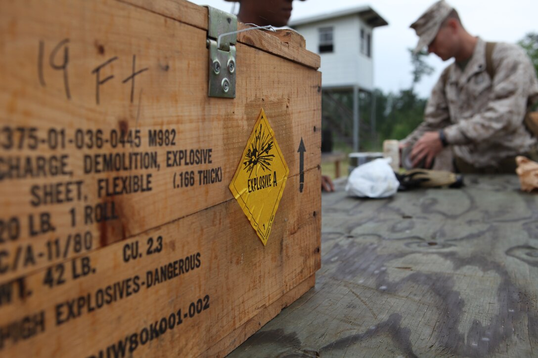 A Marine with Engineer Detachment, Combat Logistics Group 26, 26th Marine Expeditionary Unit, measures a length of fuse during a demolitions range at Realistic Urban Training aboard Fort A.P. Hill, Va., June 9, 2010. They light the fuse to test the time it takes to burn. They do this each time they open a new roll to ensure the proper burn rate. This was just one of many courses conducted during the 18-day Realistic Urban Training Exercises the MEU will participate in  as part of its pre-deployment training. The urban environment is among the most challenging tactical environments MEU Marines may face during their scheduled deployment later this fall.